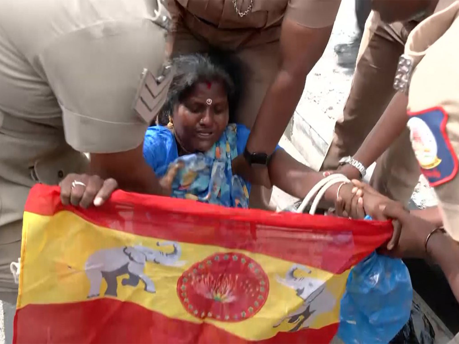 Police detains TVK supporters protesting outside Lok Bhavan in Chennai (Photo/ANI)