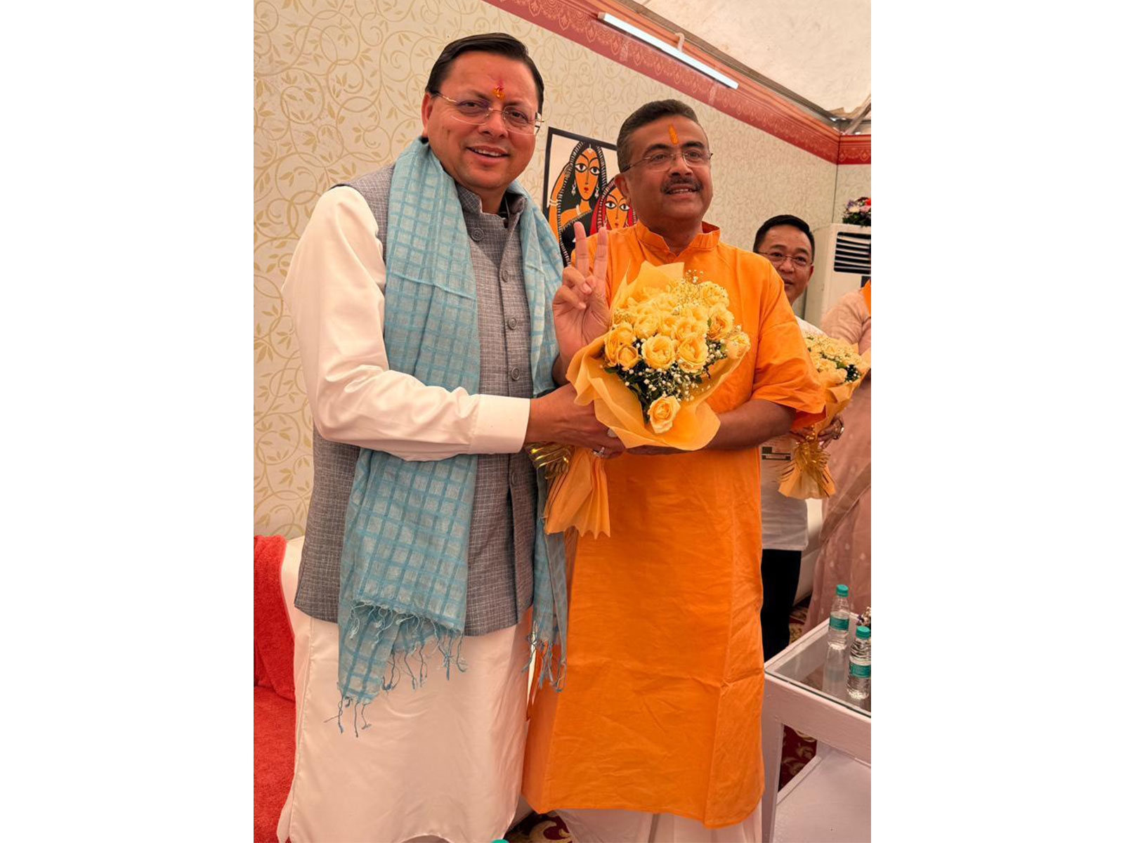 Uttarakhand Chief Minister Pushkar Singh Dhami with West Bengal Chief Minister Suvendu Adhikari (Photo/ANI)