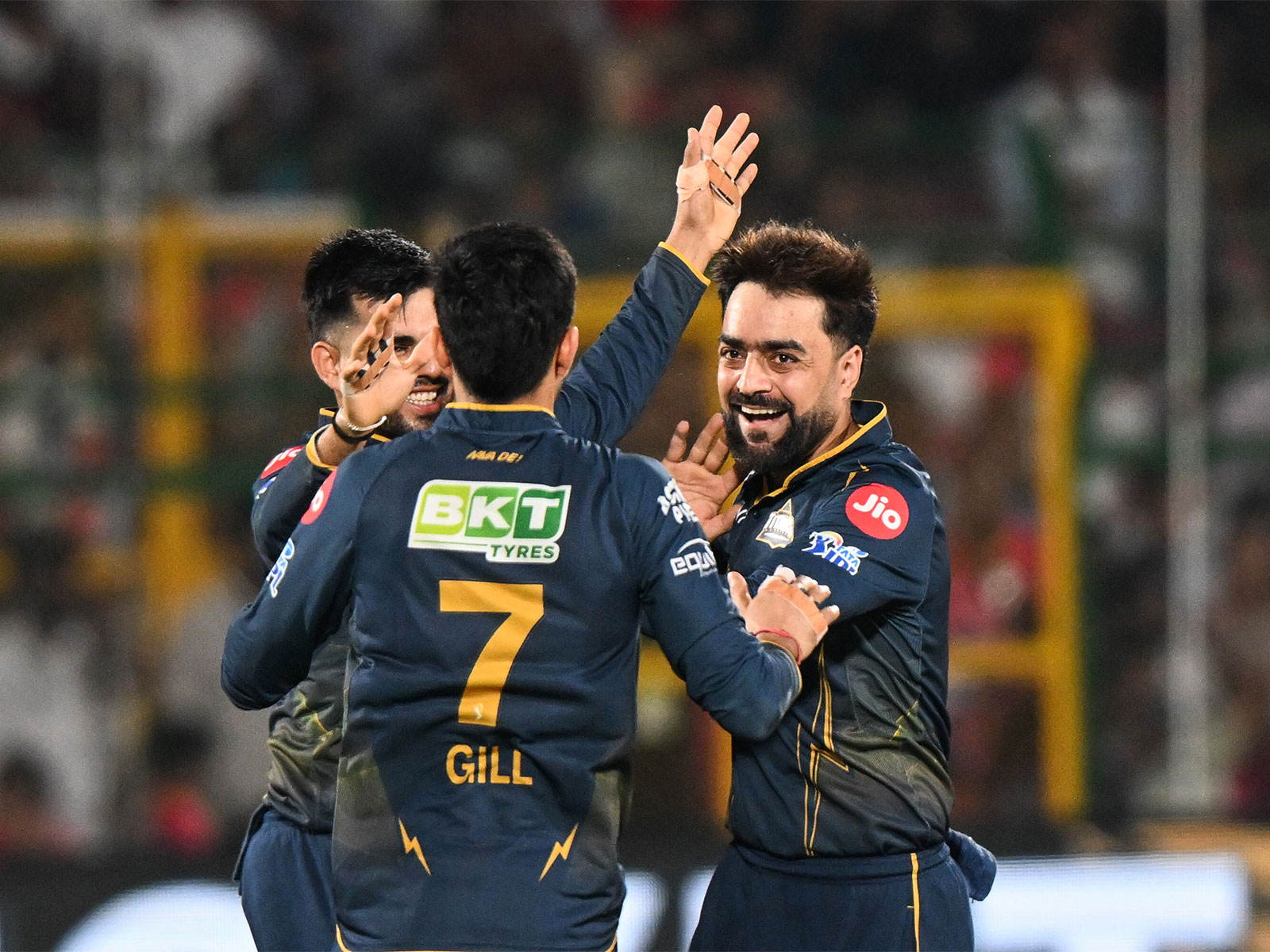 Rashid Khan celebrating with his teammates. (Photo/ANI)