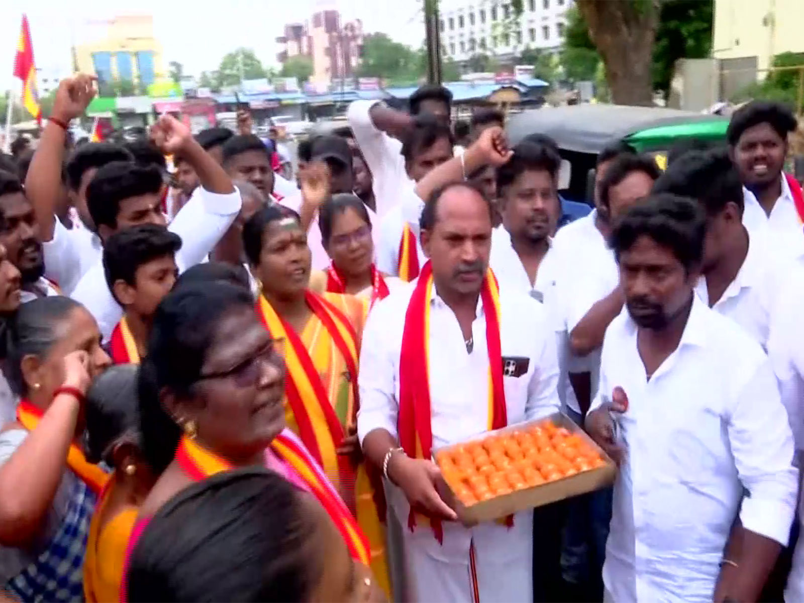 TVK workers distribute sweets and celebrate (Photo/ANI)