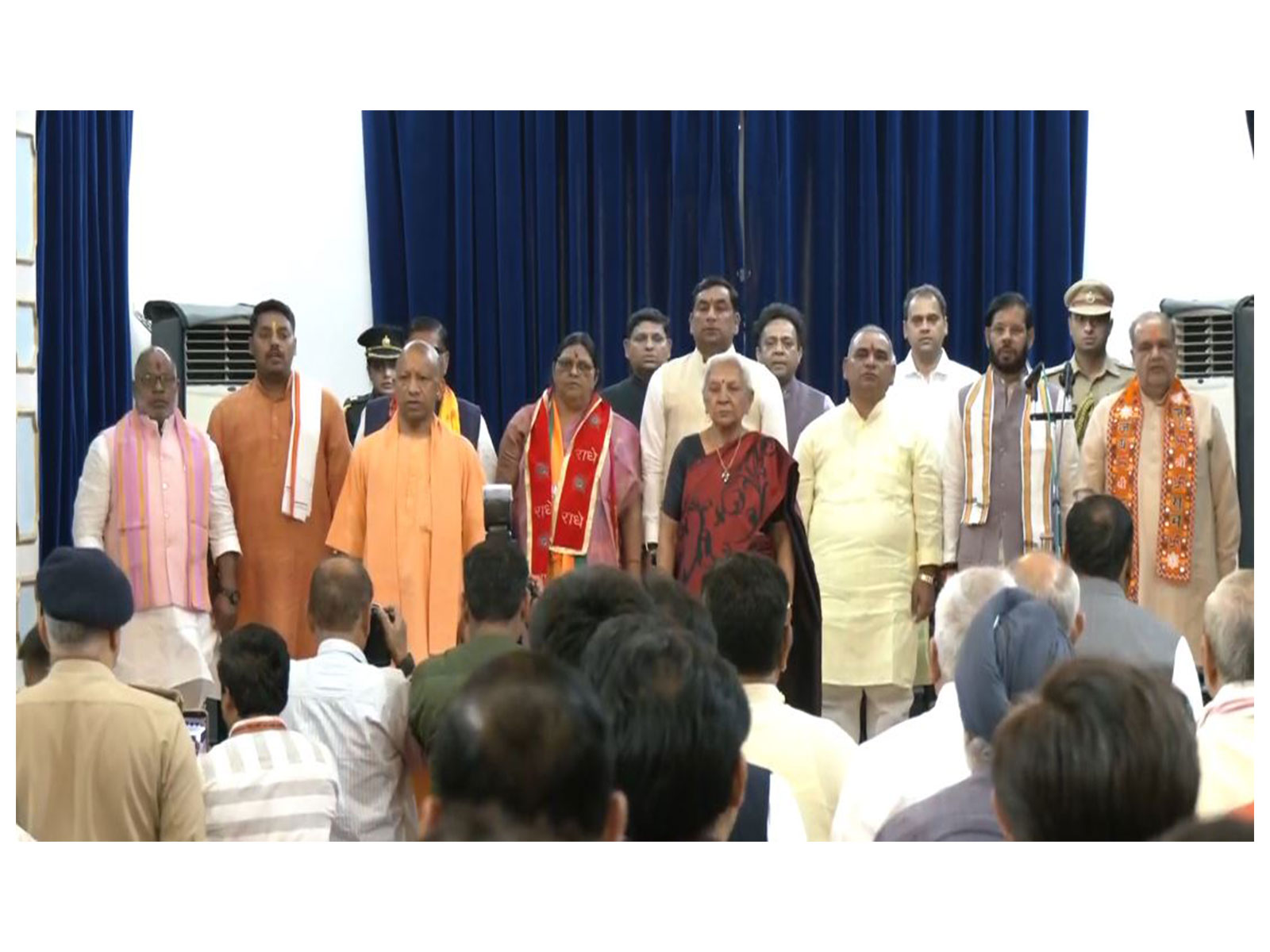 UP CM Yogi Adityanath along with newly inducted ministers during the Uttar Pradesh cabinet expansion at Lok Bhavan in Lucknow (Photo/ANI)