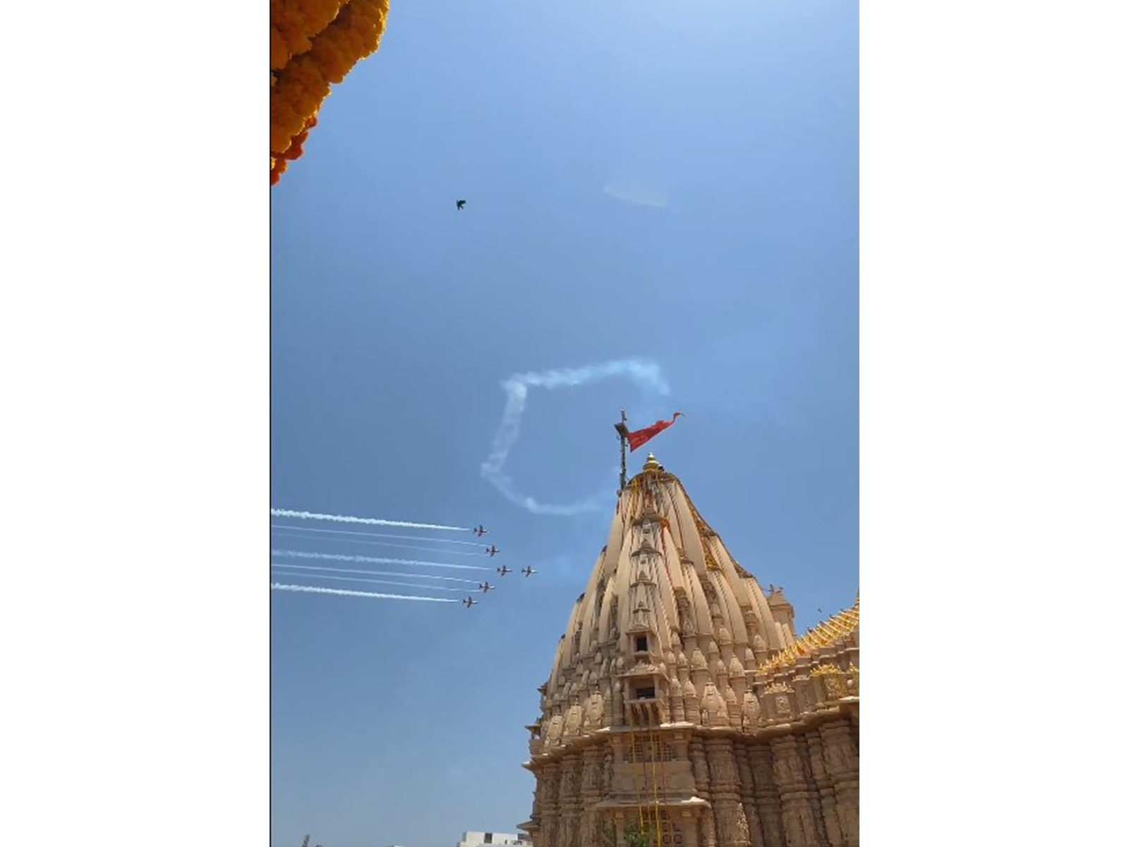 IAF's Suryakiran team performs a flypast over Somnath as PM Modi praises the display of Bhakti and Shakti (Photo/@narendramodi)