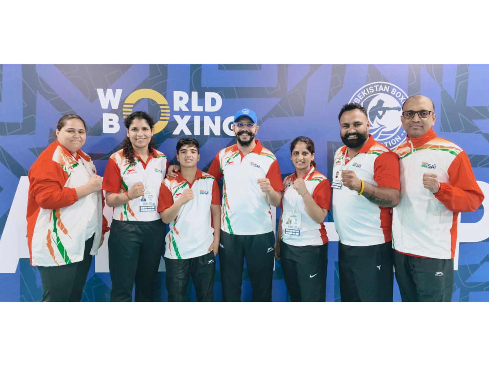 Rakhi (third from left) celebrates her SF win with coaches (Photo: Asian Boxing)