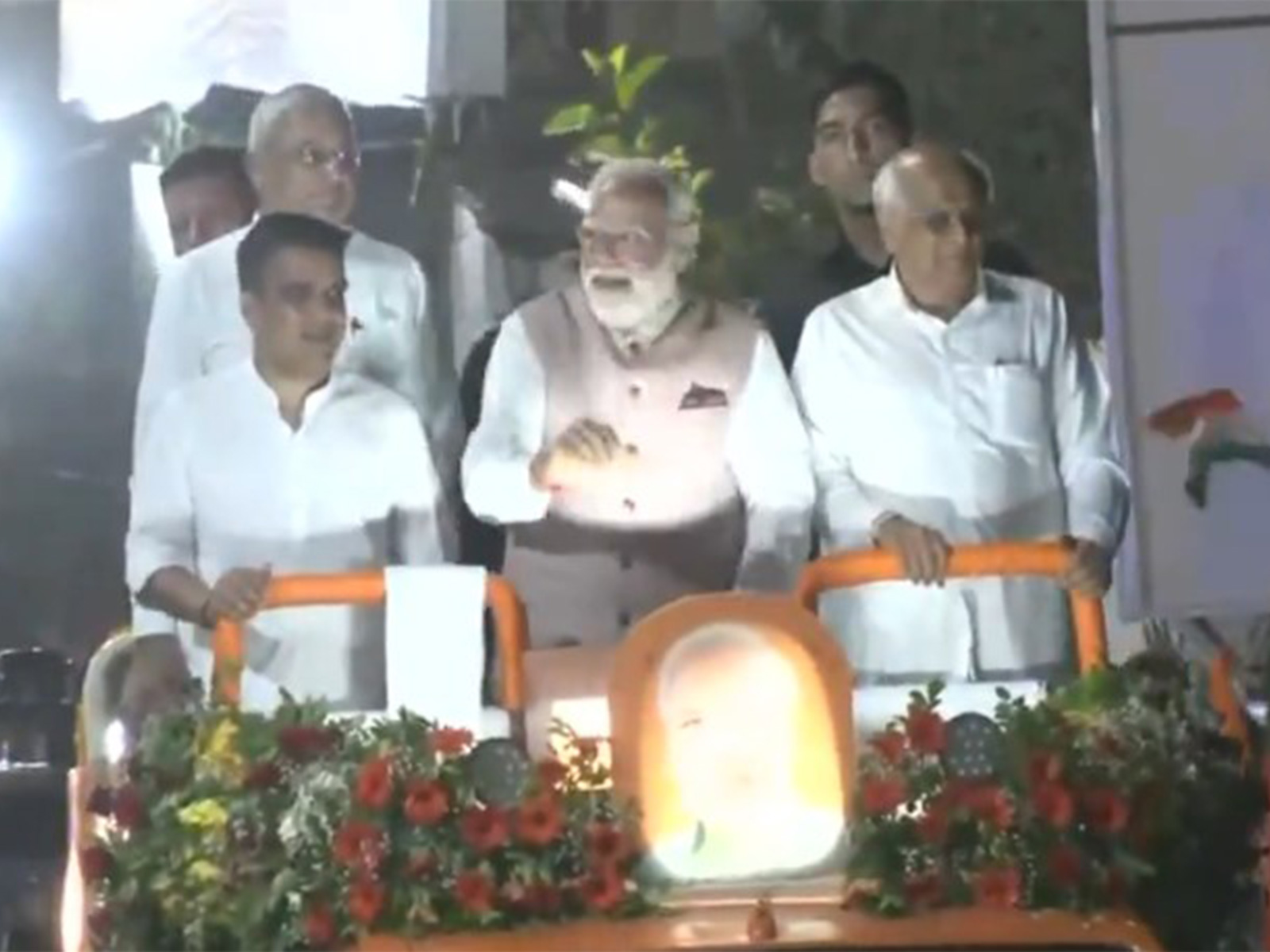 PM Narendra Modi with Gujarat CM Bhupendra Patel and Deputy CM Harsh Sanghvi (Photo/ANI/DD News)