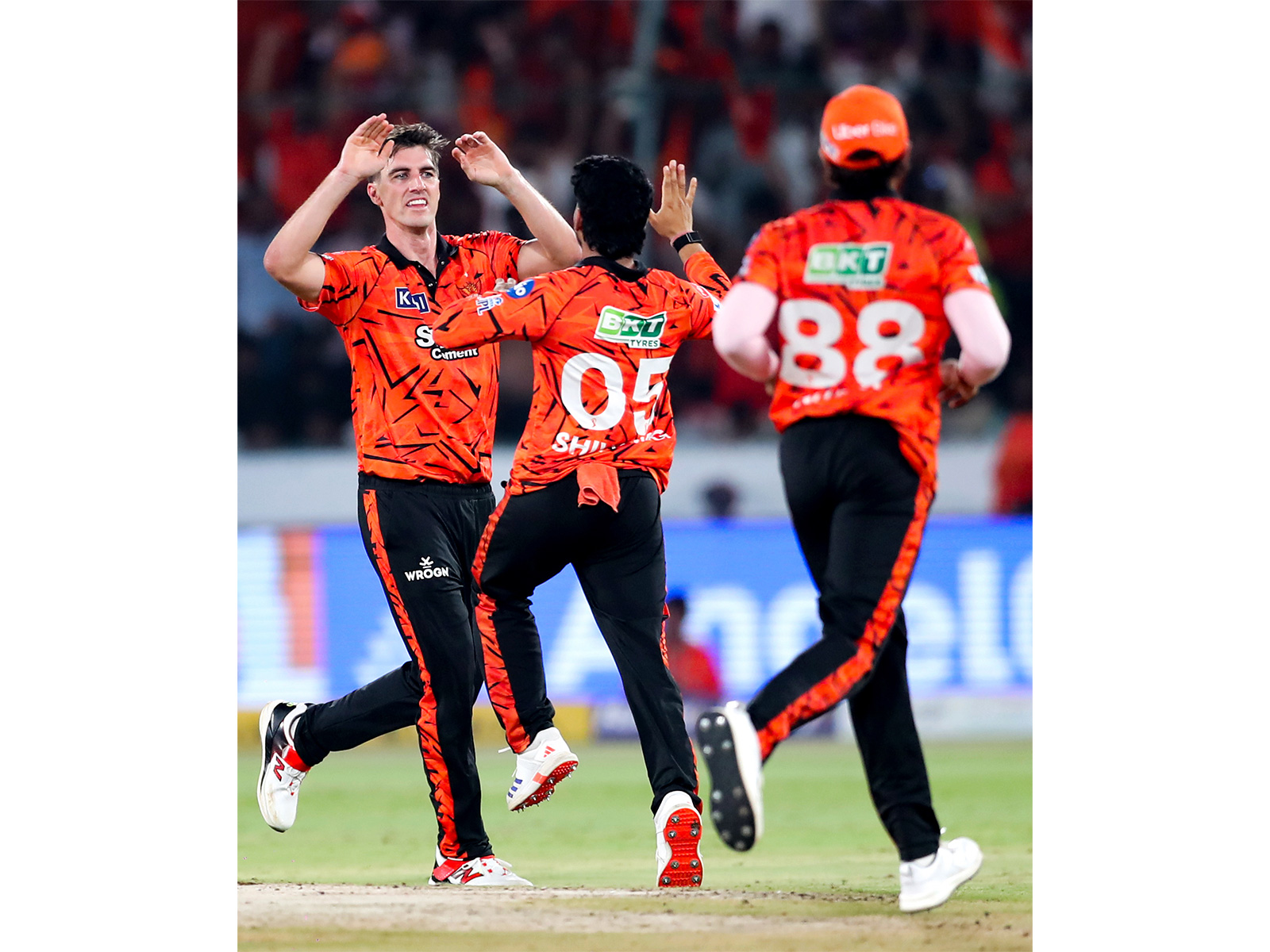 SRH skipper Pat Cummins (left) with his teammates (Photo/ANI)