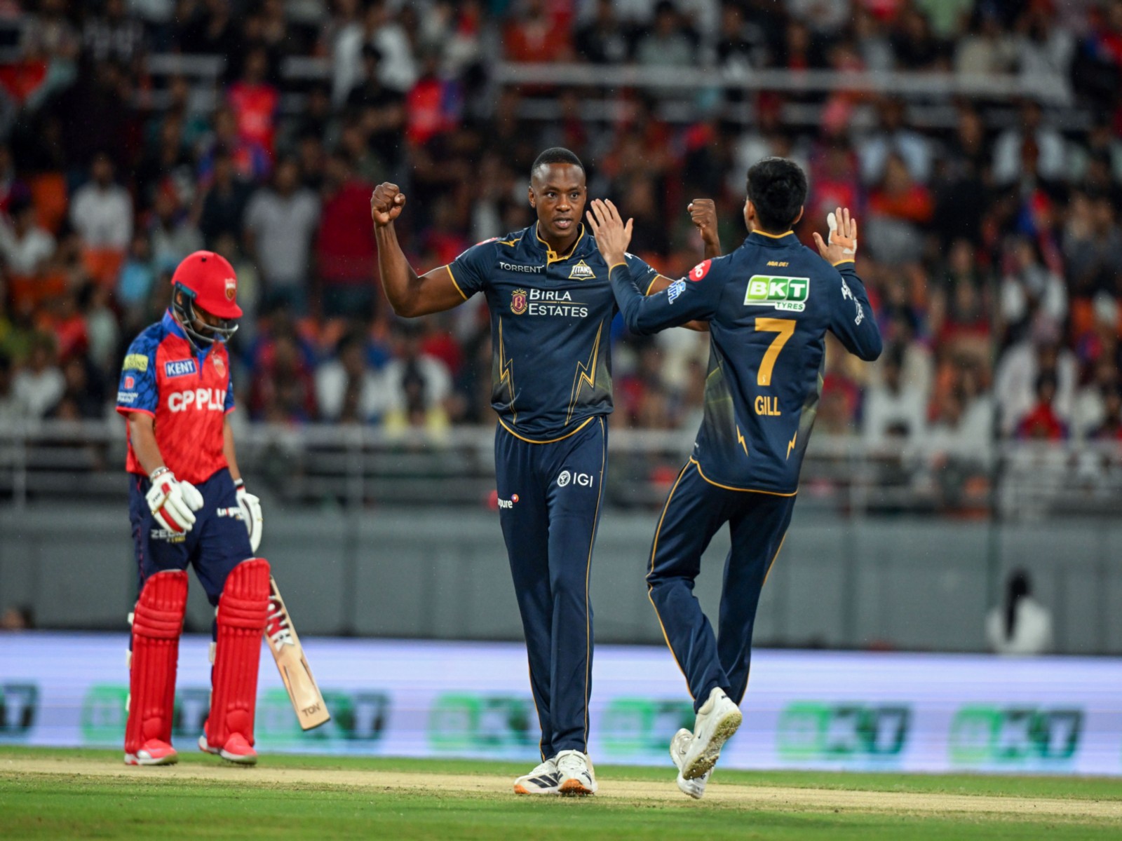 Gujarat Titans' Kagiso Rabada and skipper Shubhman Gill. (Photo/ANI)