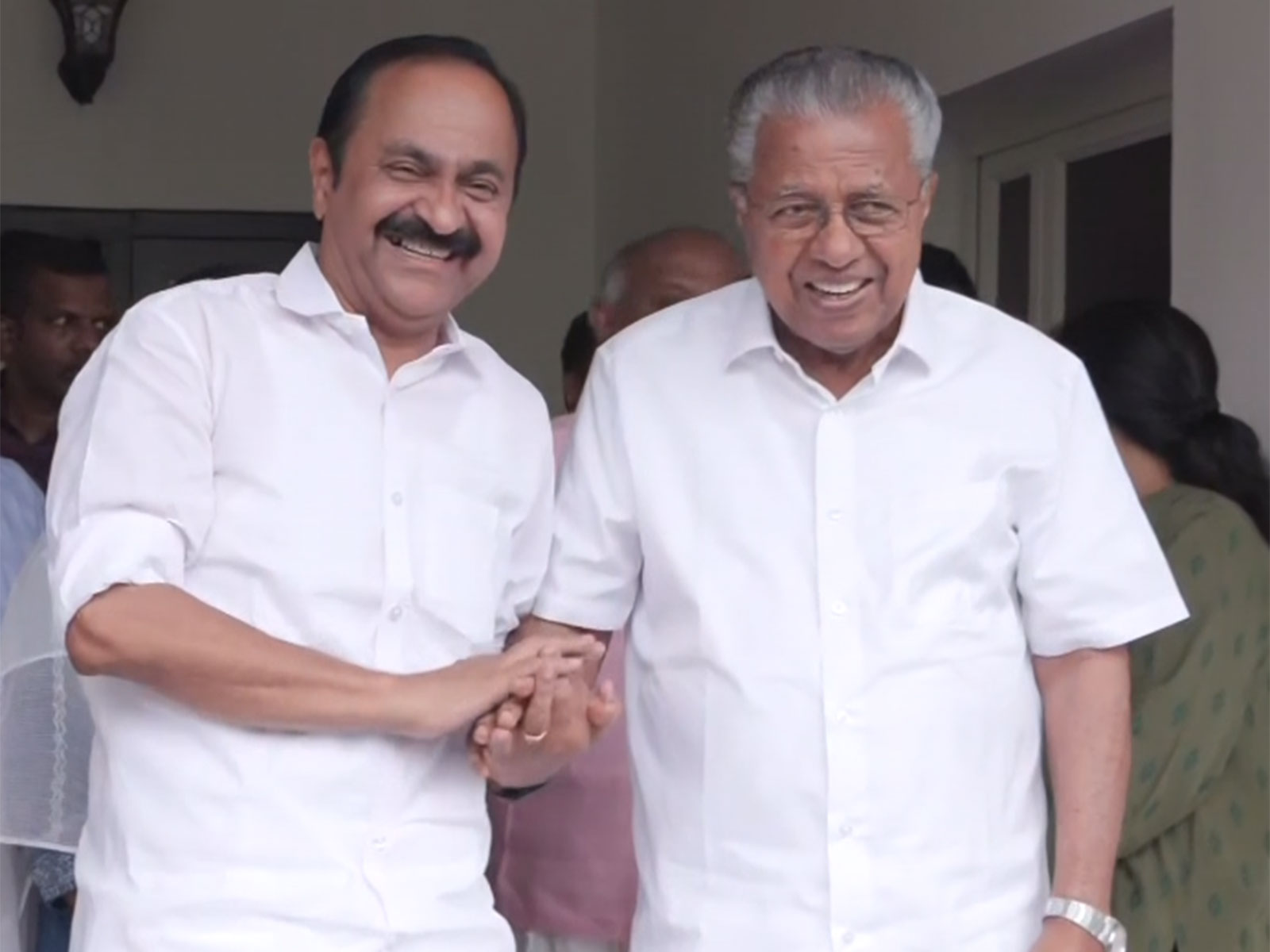 Keralam CM-designate VD Satheesan with outgoing CM and LoP Pinarayi Vijayan in Thiruvananthapuram (Photo/ANI)