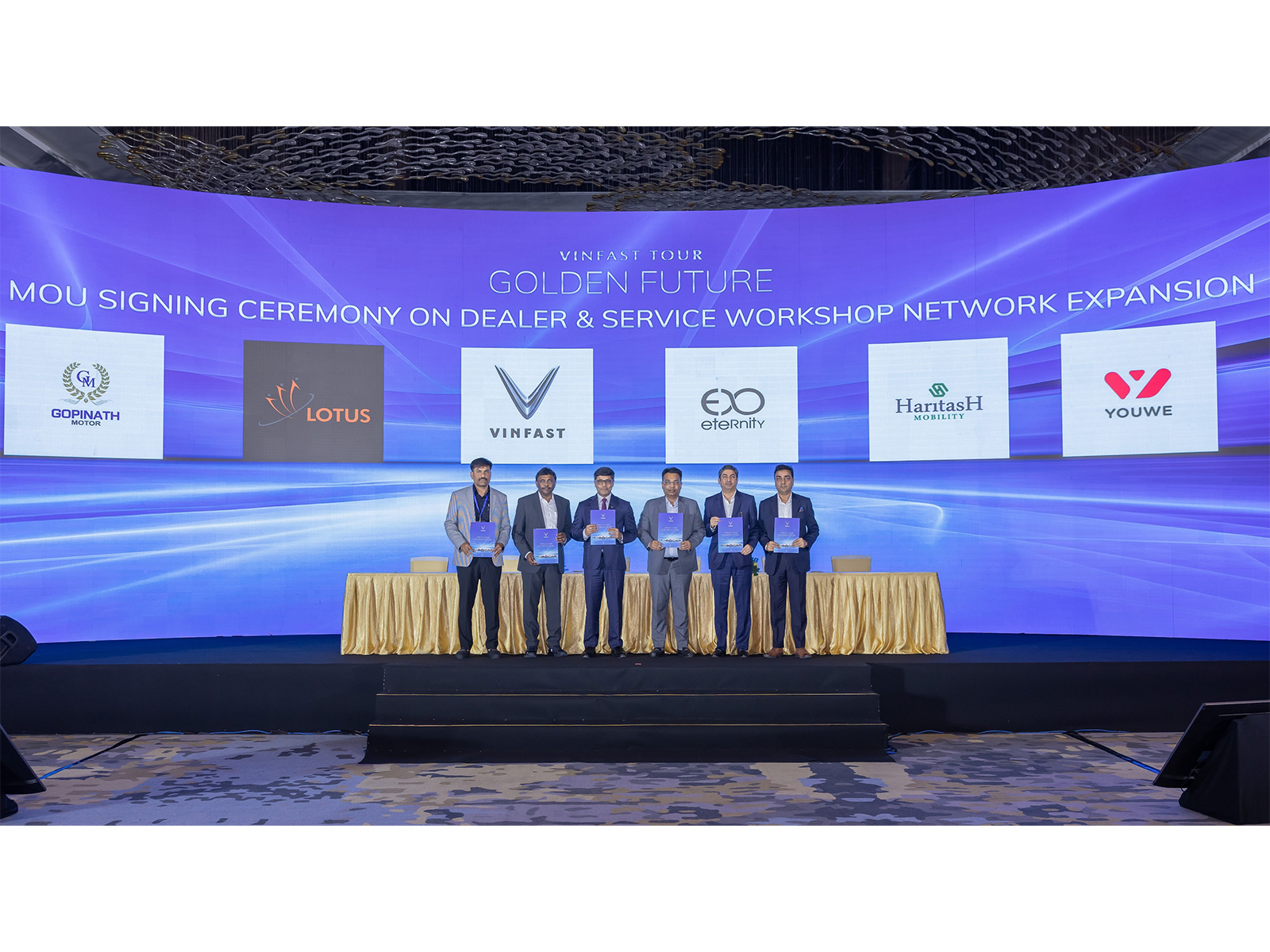 Mr. Tapan Ghosh (third from left), CEO of VinFast India, signs an MOU with after-sales partners in India