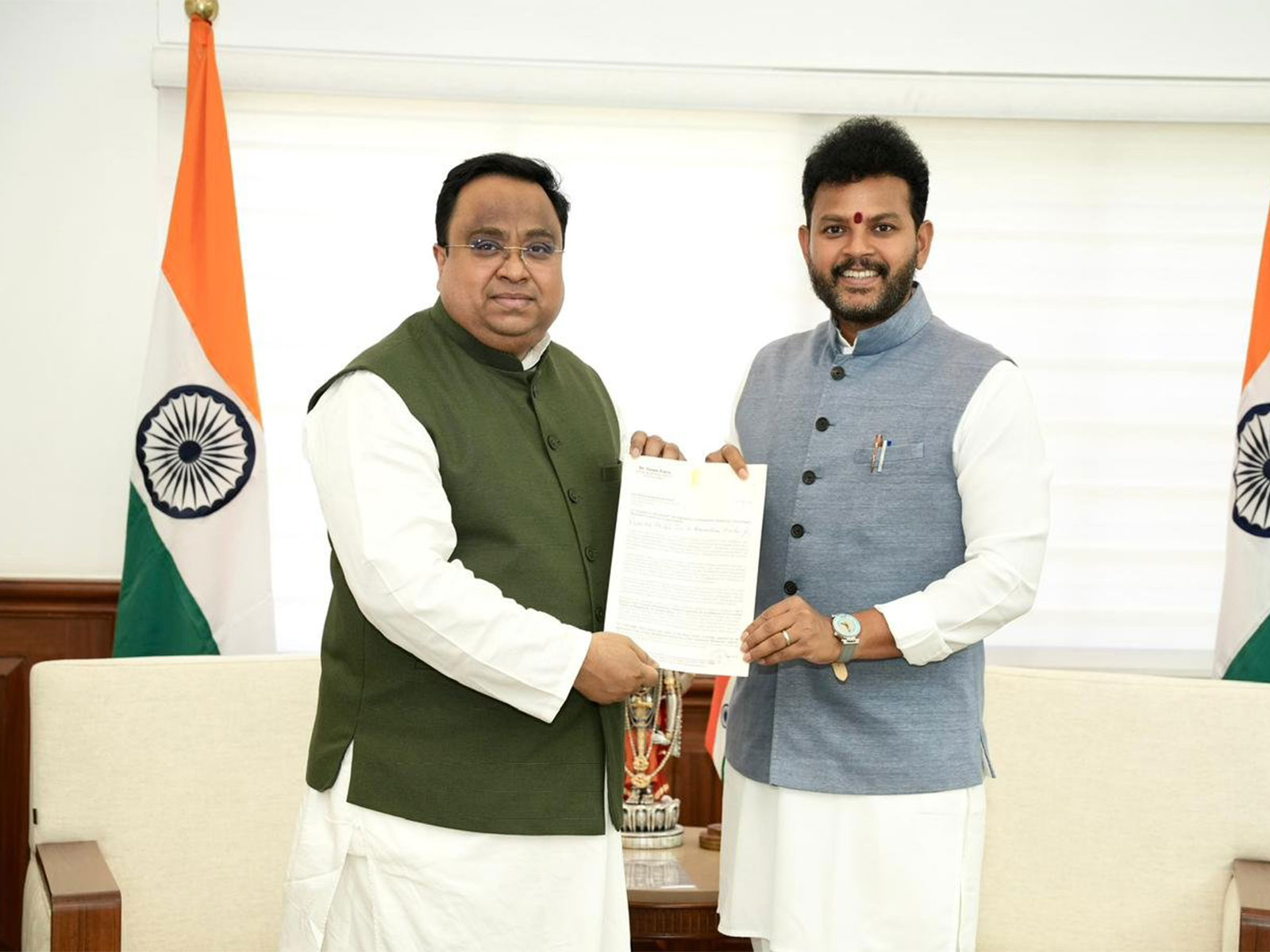 Civil Aviation Minister Kinjarapu Rammohan Naidu and BJD MP Sasmit Patra (Photp/Sasmit Patra's Office)