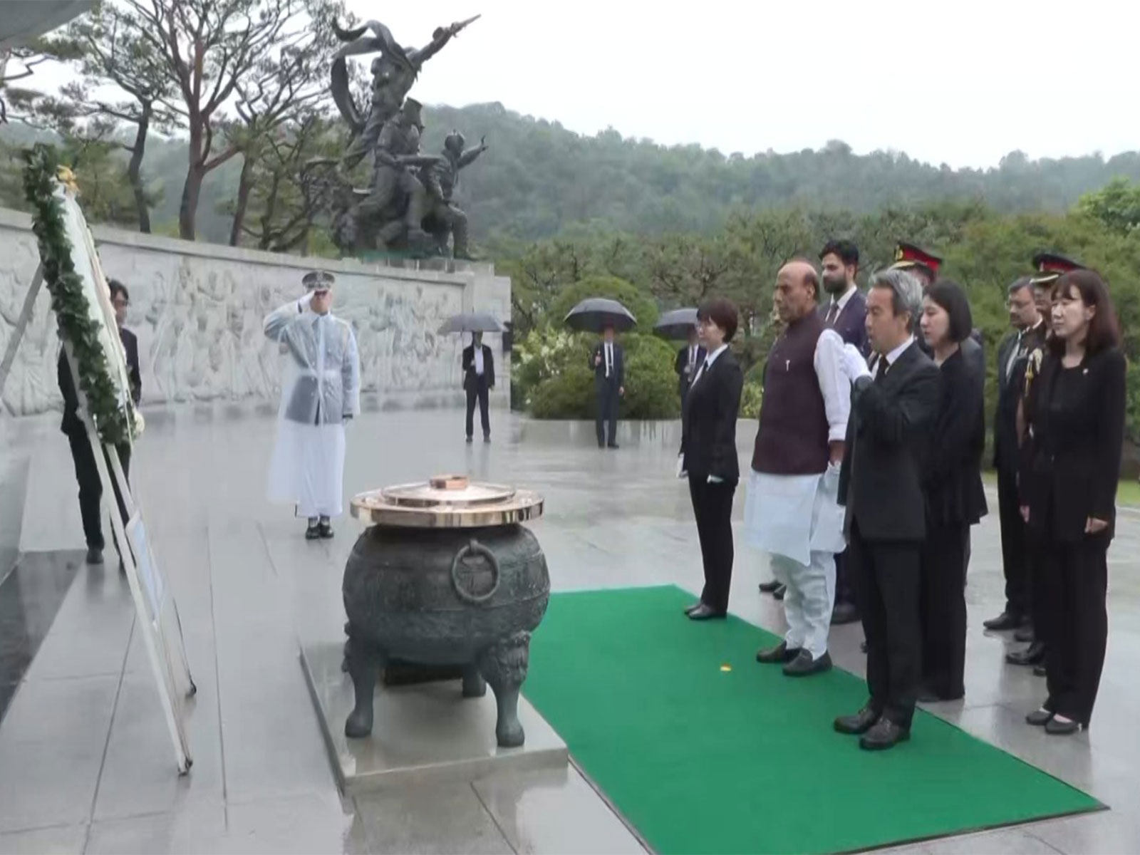 Rajnath Singh pays tribute at Seoul National Cemetery (Photo/ANI)
