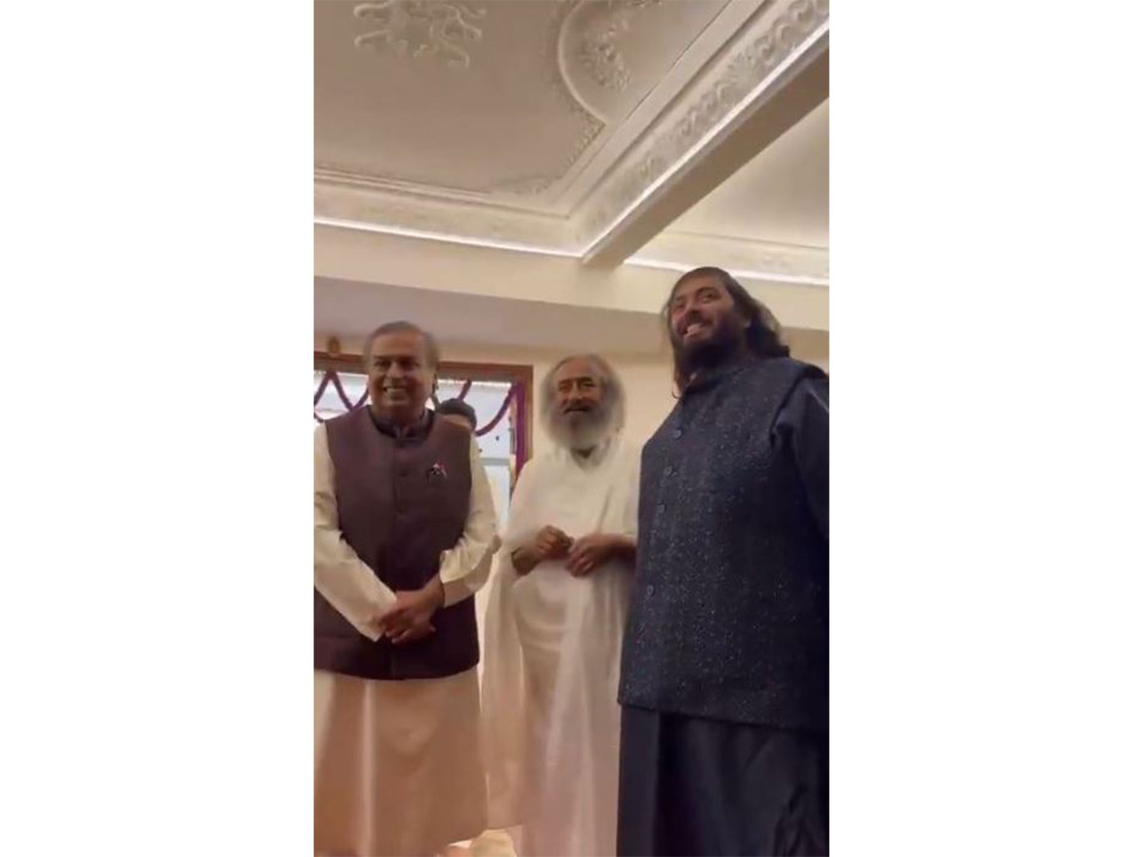 Chairman & Managing Director of Reliance Industries Limited Mukesh Ambani and his son Anant Ambani with spiritual leader Sri Sri Ravi Shankar (Photo: Art of Living Foundation)