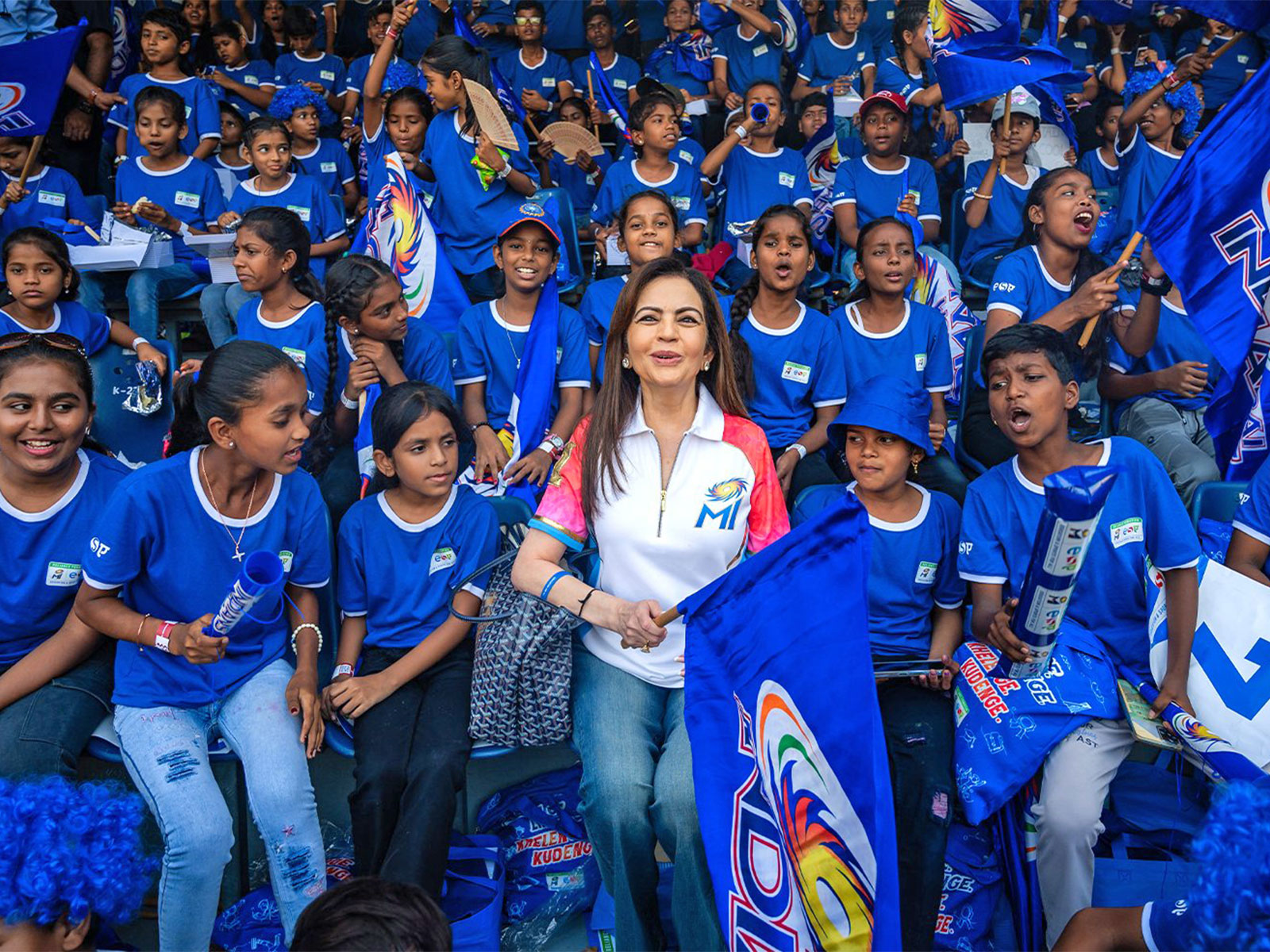 Co-owner of MI, Nita Ambani with children watching an IPL match. (Photo/ANI)
