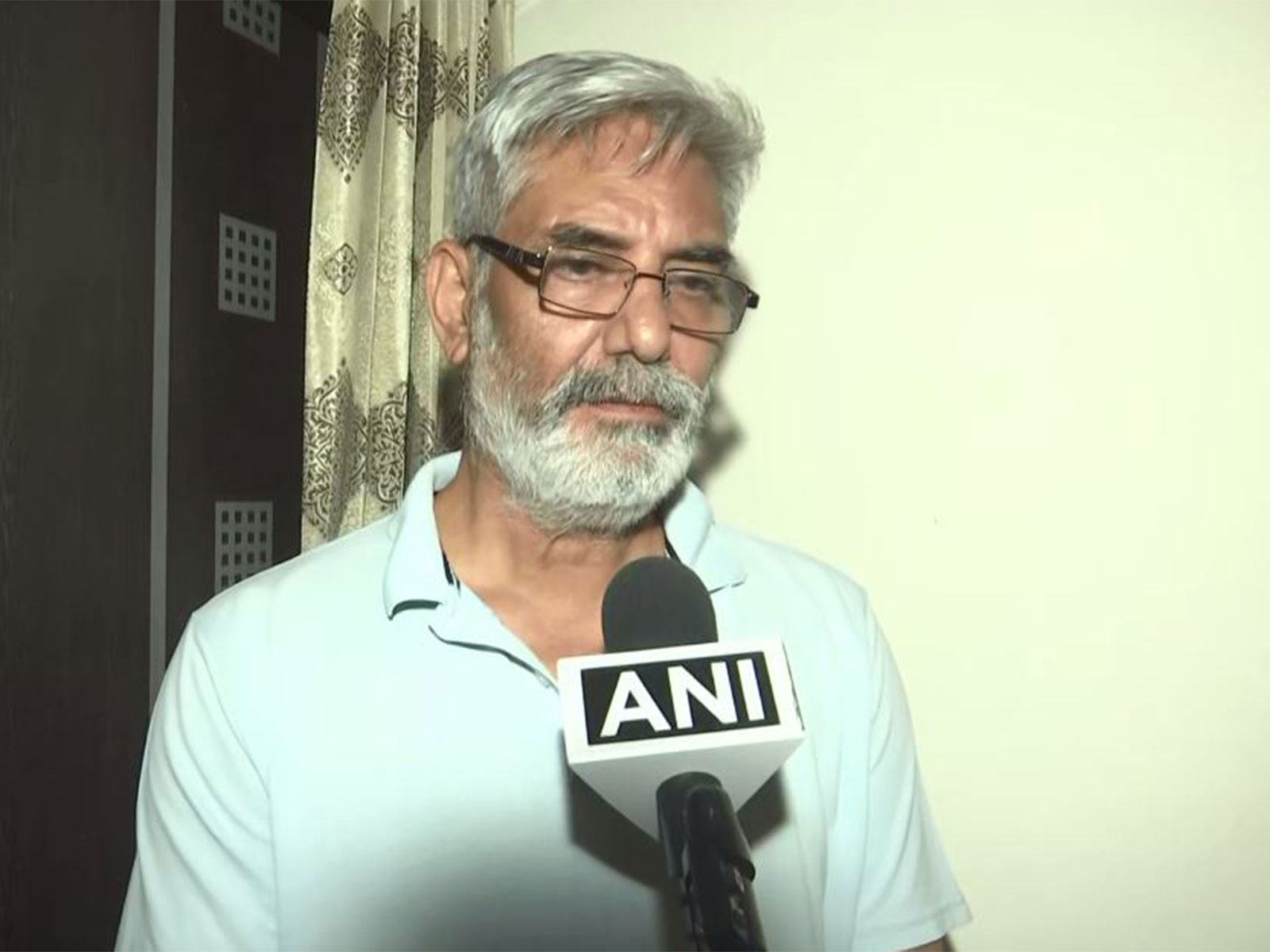Navnidhi Sharma, Twisha Sharma's father (Photo/ANI)