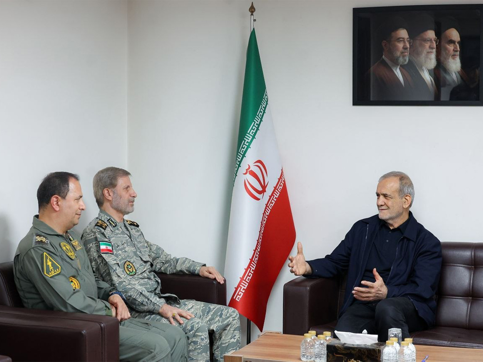 Iranian President Masoud Pezeshkian meets Iranian Army Commander-in-Chief Major General Amir Hatami during a high-level security meeting focused on military readiness and national defence. (Image Source: Iranian state media)