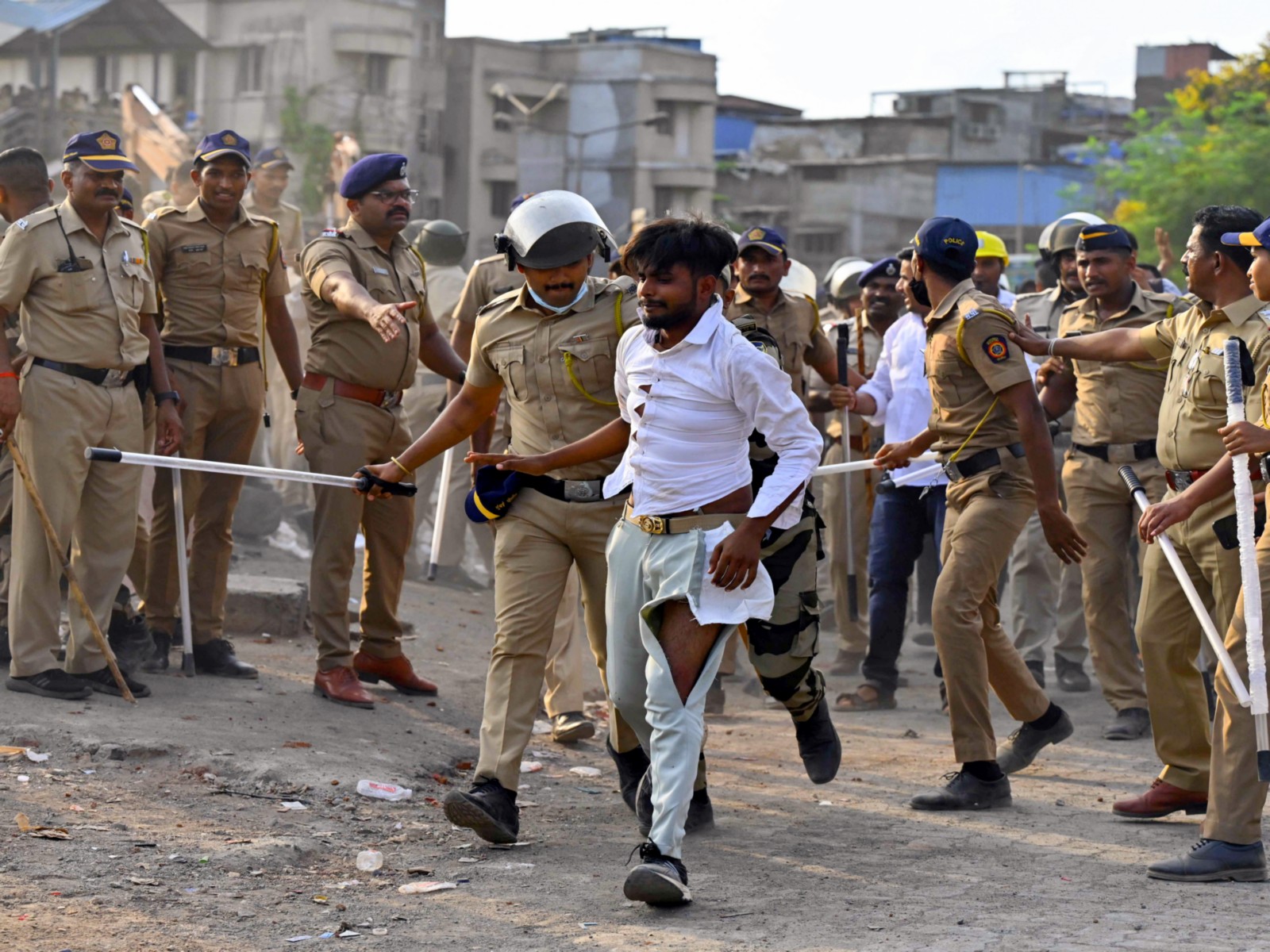 Police carry out lathi charge after slum residents in Bandra East allegedly pelt stones (Photo/ANI)