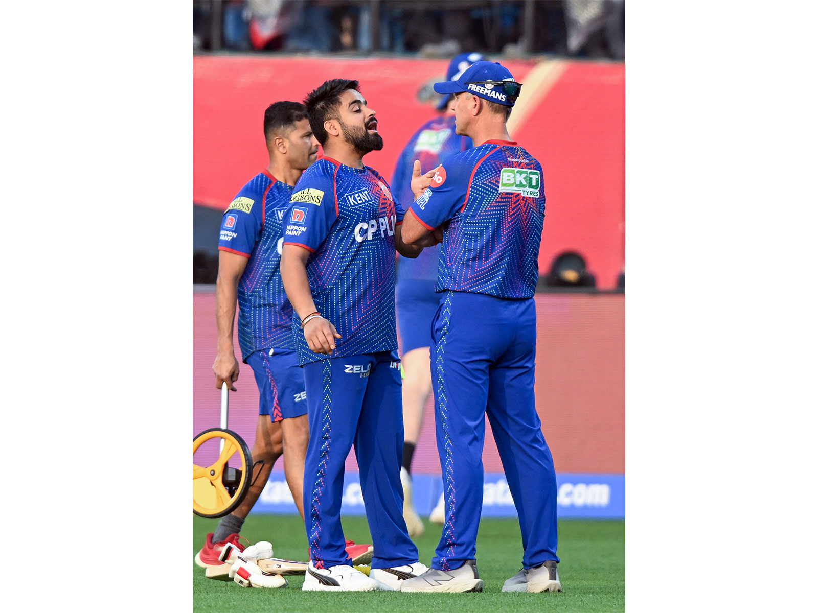 PBKS head coach Ricky Ponting (R) with players. (Photo/ANI)
