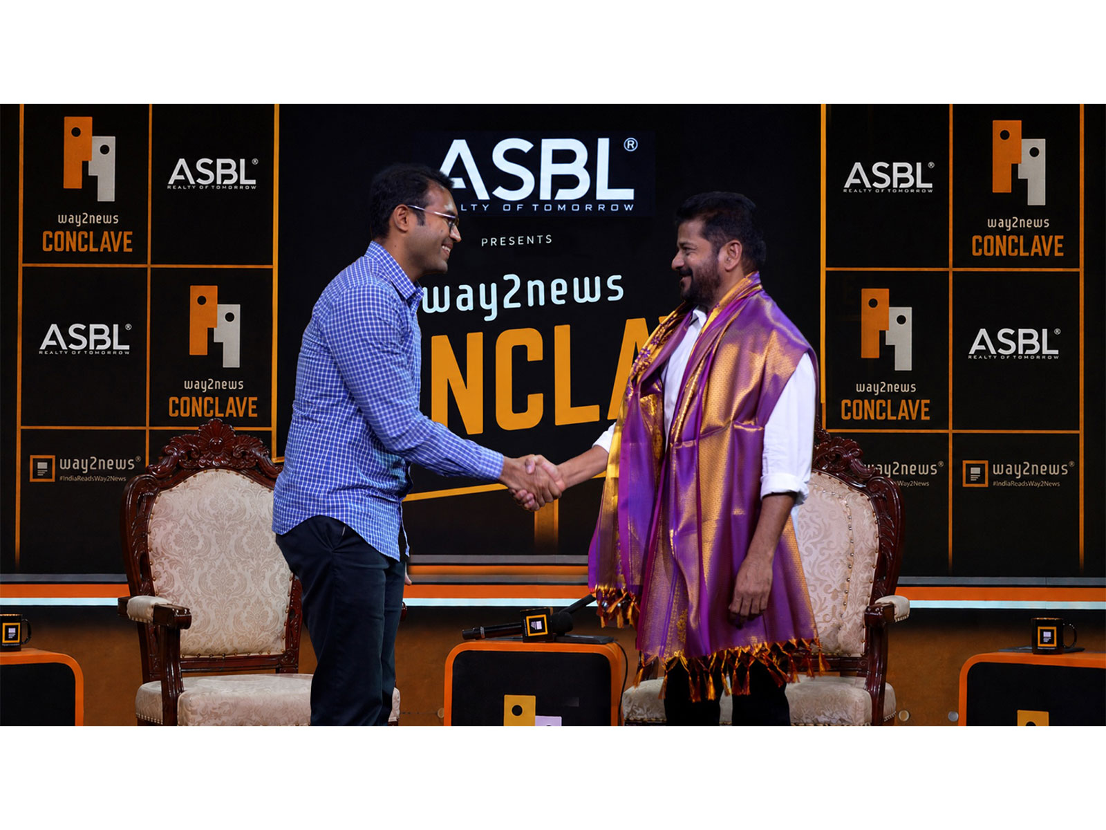 Ajitesh Korupolu, CEO and founder of ASBL with CM Revanth Reddy at Way2News conclave