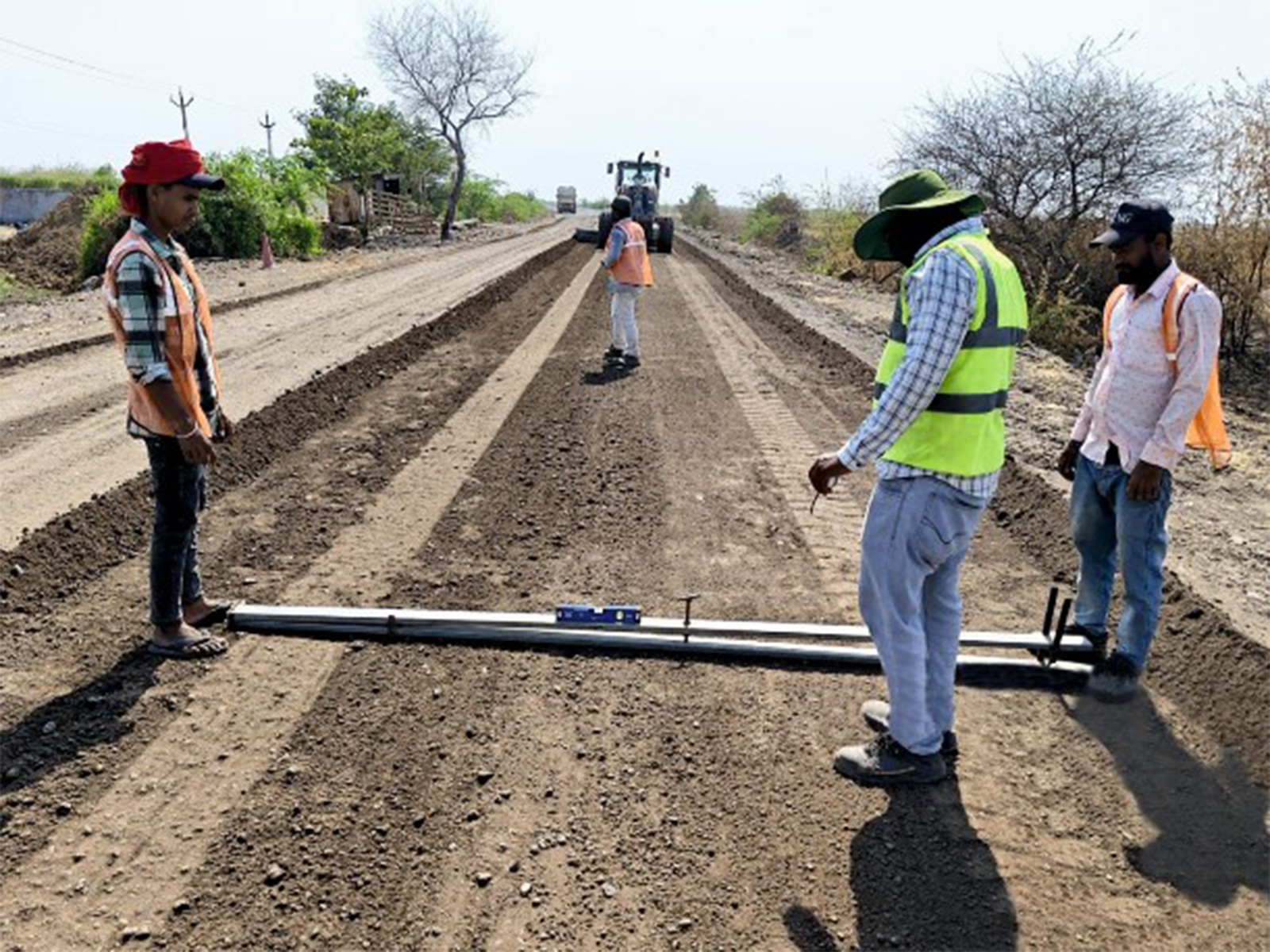 Road development using green technology (Photo/Gujarat CMO)