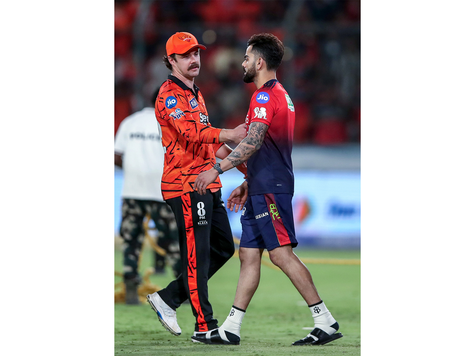 Travis Head (left) and Virat Kohli (right) (Photo: ANI)