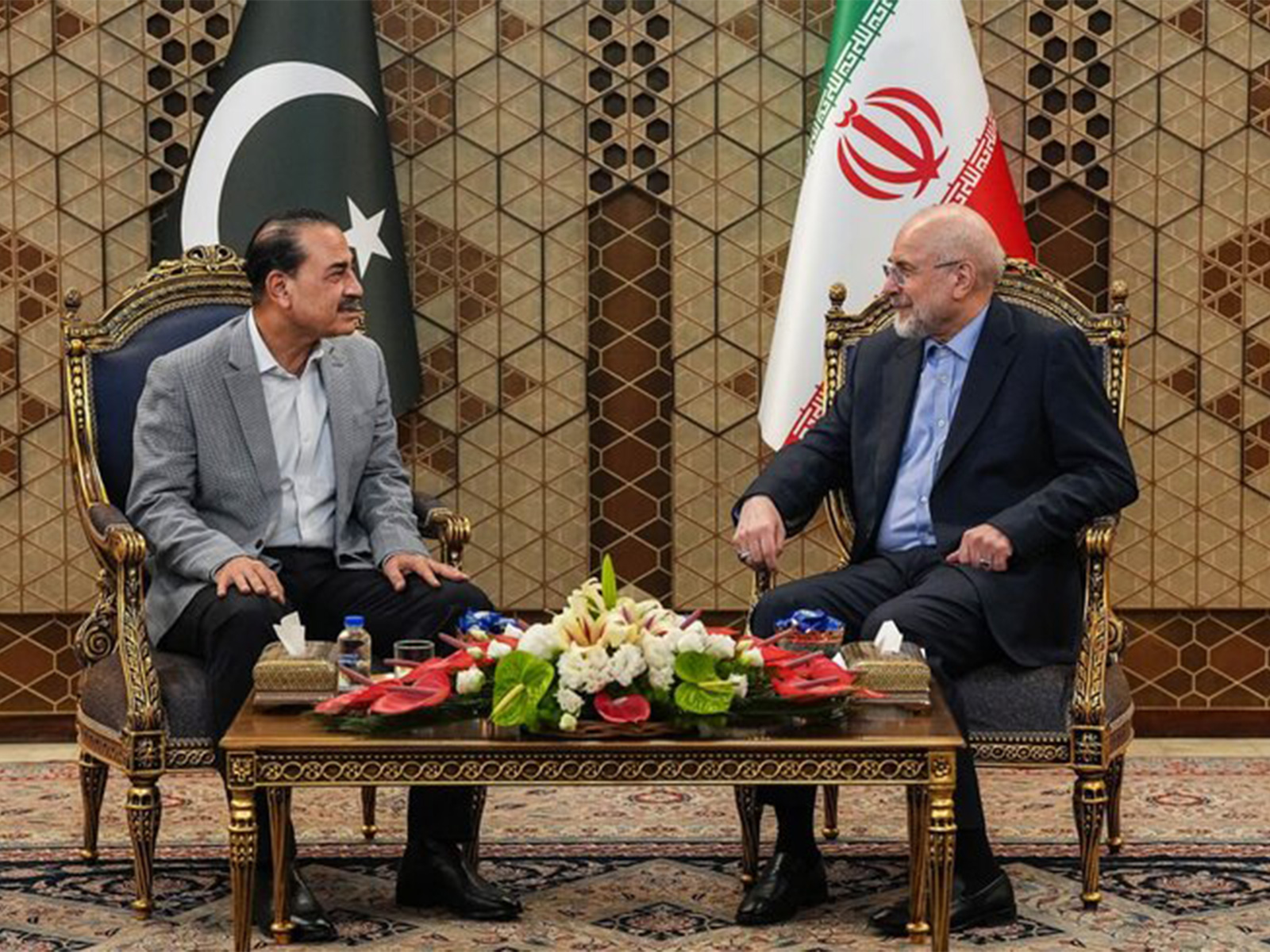 Iran Parliament Speaker Mohammad Bagher Ghalibaf (R) meets with Pakistan Army Chief General Asim Munir (L) in Tehran (Image Source: Iranian state media)