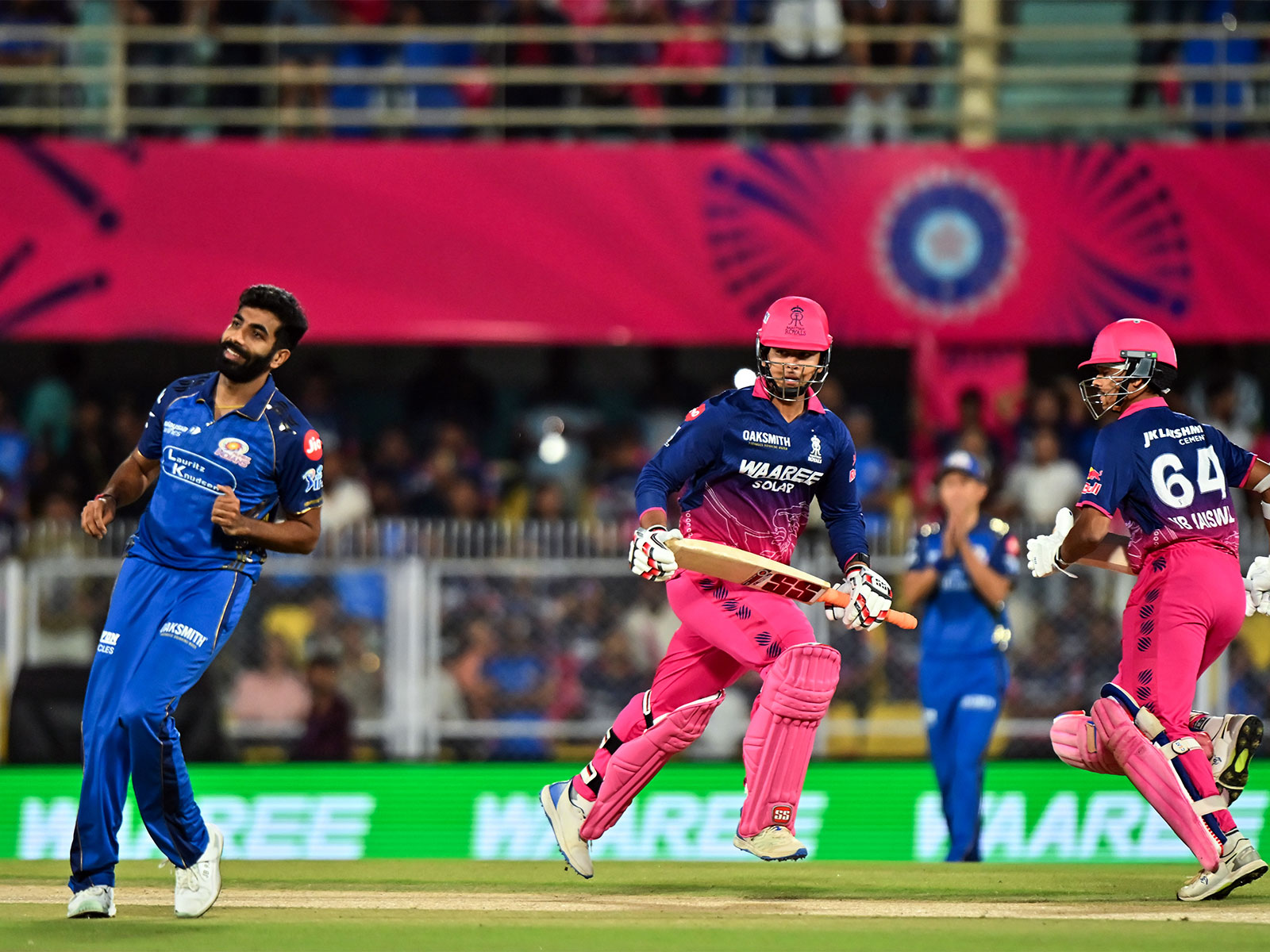 RR and MI players in action (Photo: ANI)