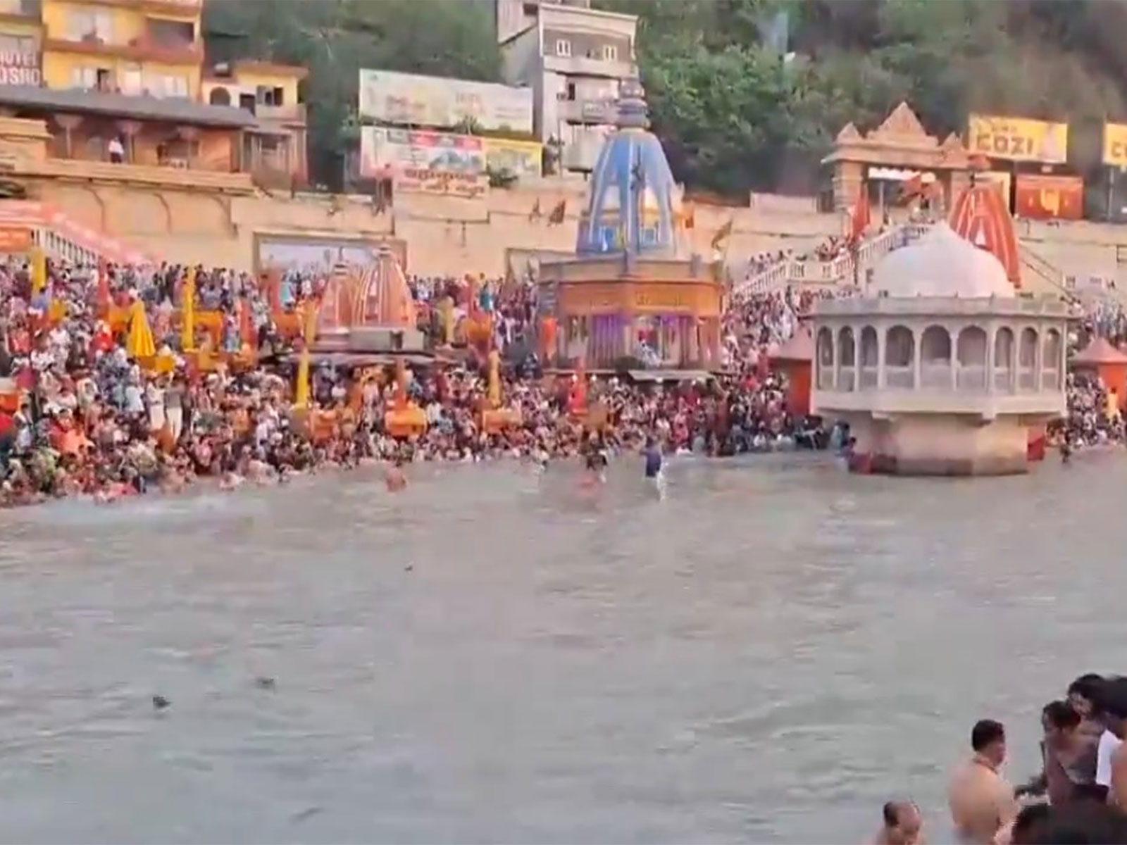 Devotees gathered on banks of Ganga (Photo/ANI)