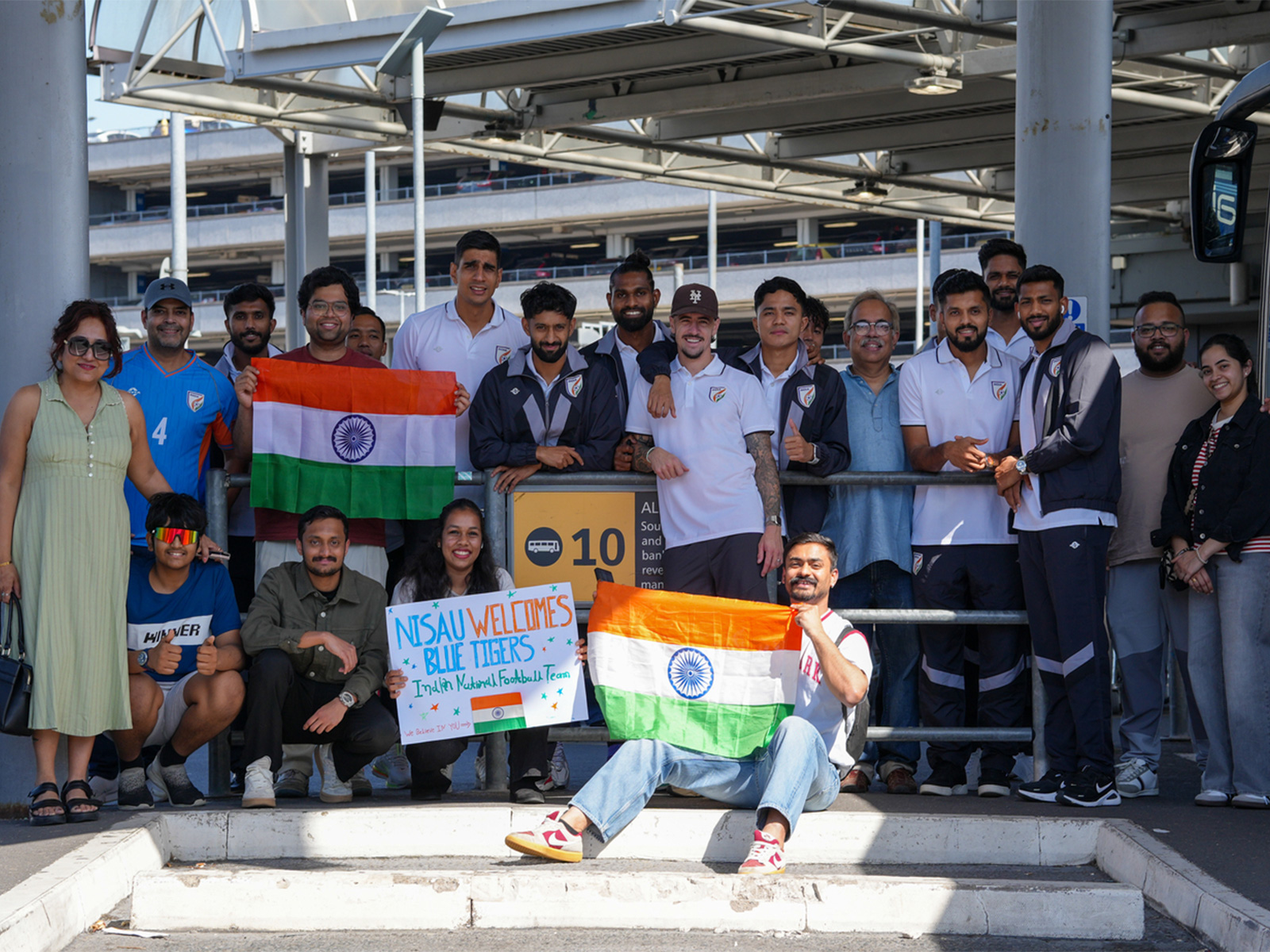Indian football players with fans after arrival in London (Image: AIFF media)