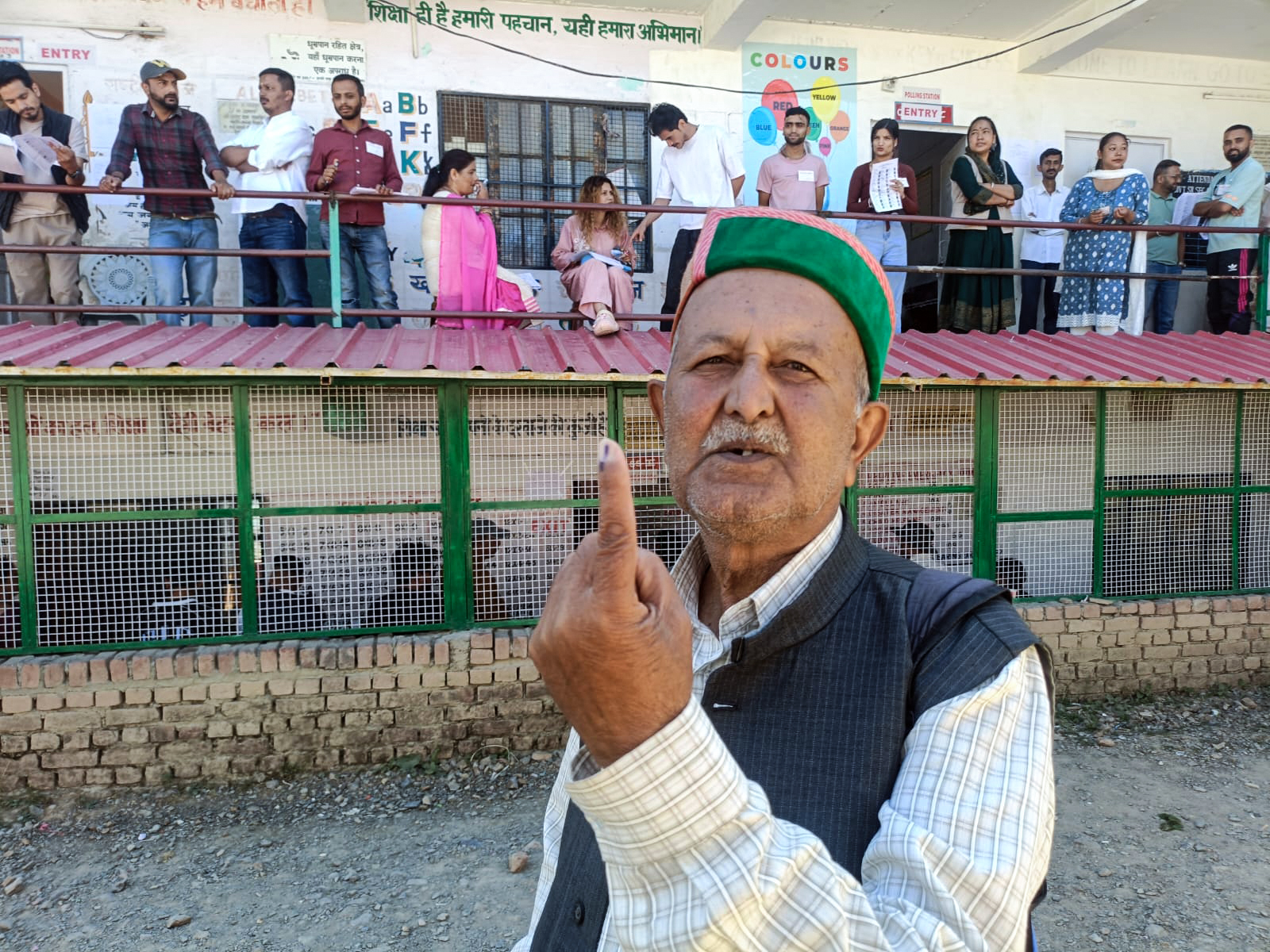 An elderly man casting a vote in the first phase of Himachal panchayat elections,. (ANI Photo)
