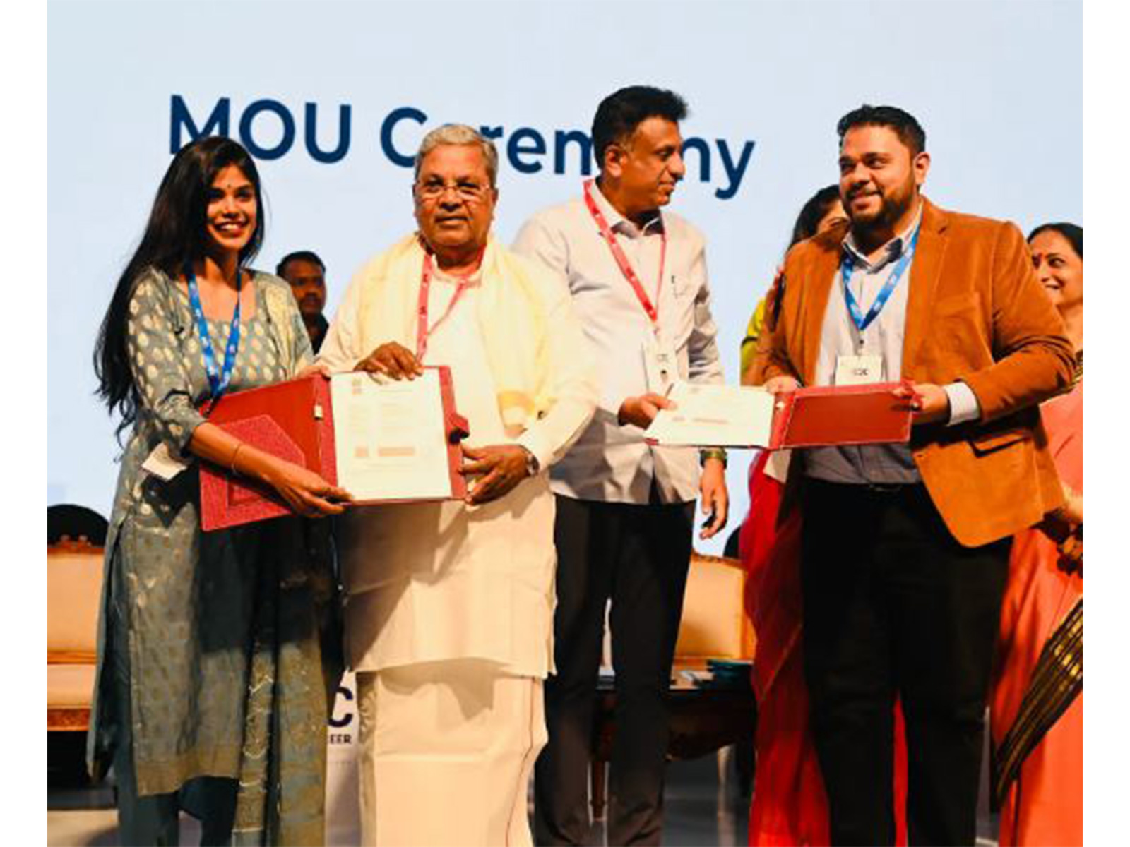 Mythri Kumar, Co-Founder, TimBuckDo, signs an MoU with Karnataka Government's DCTE in the presence of Hon'ble CM Shri Siddaramaiah