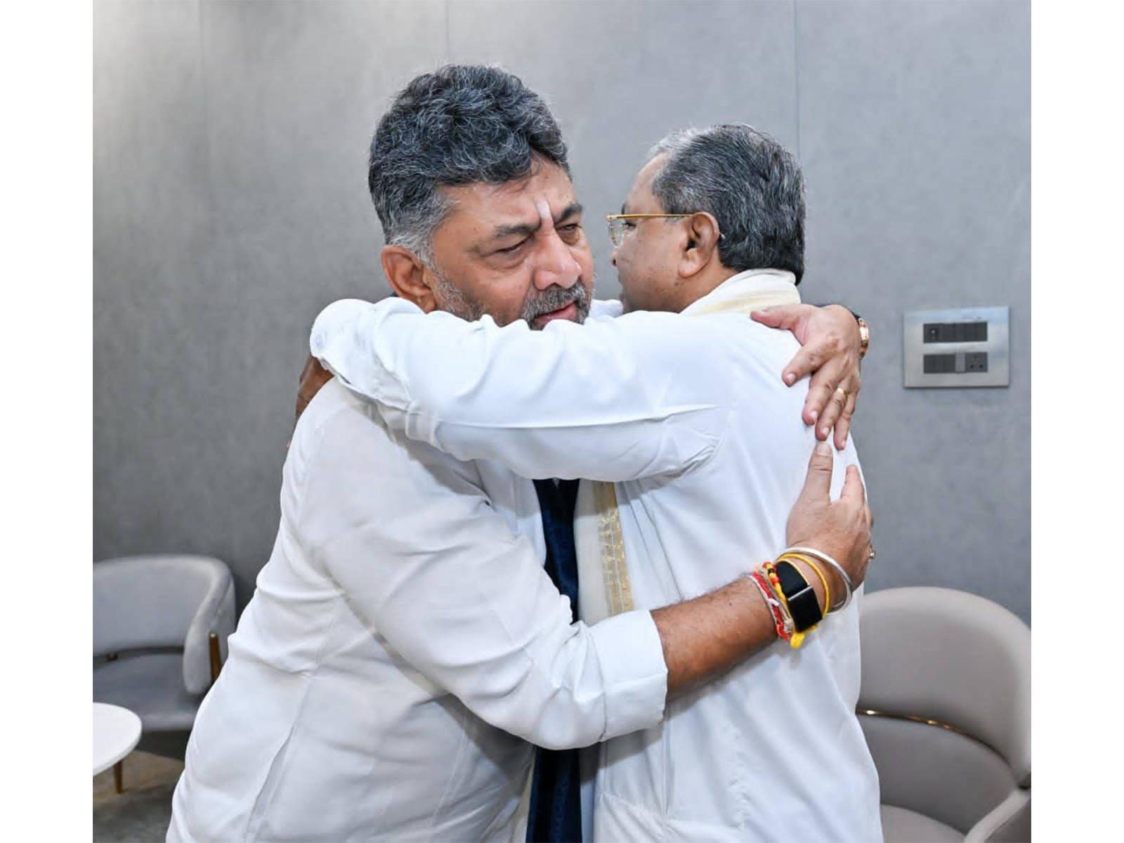 Karnataka Chief Minister Siddaramaiah and Deputy Chief Minister DK Shivakumar hug each other (Photo/X/INCKarnataka)