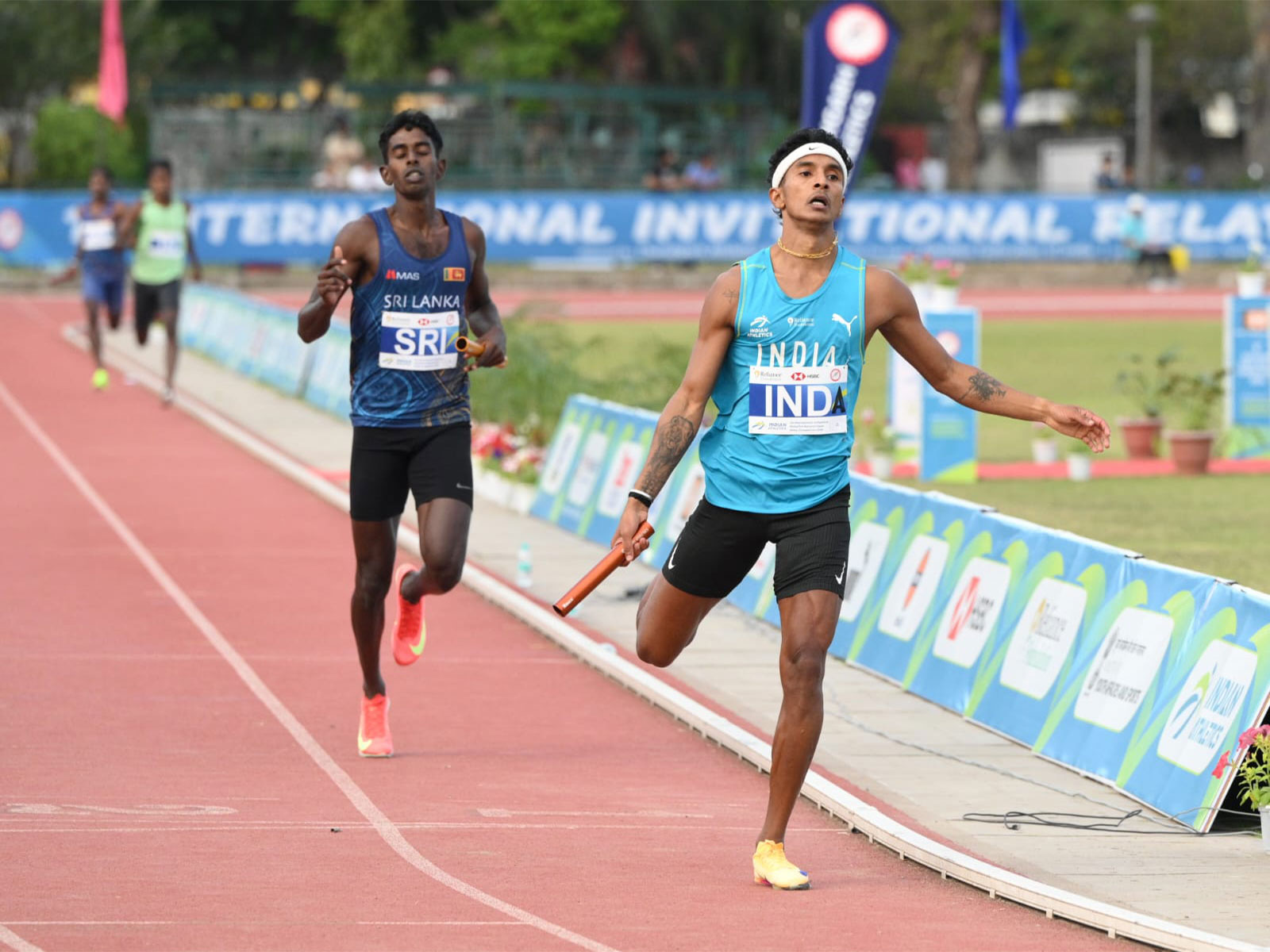 Athletes in action during a relay race. (Photo/AFI)