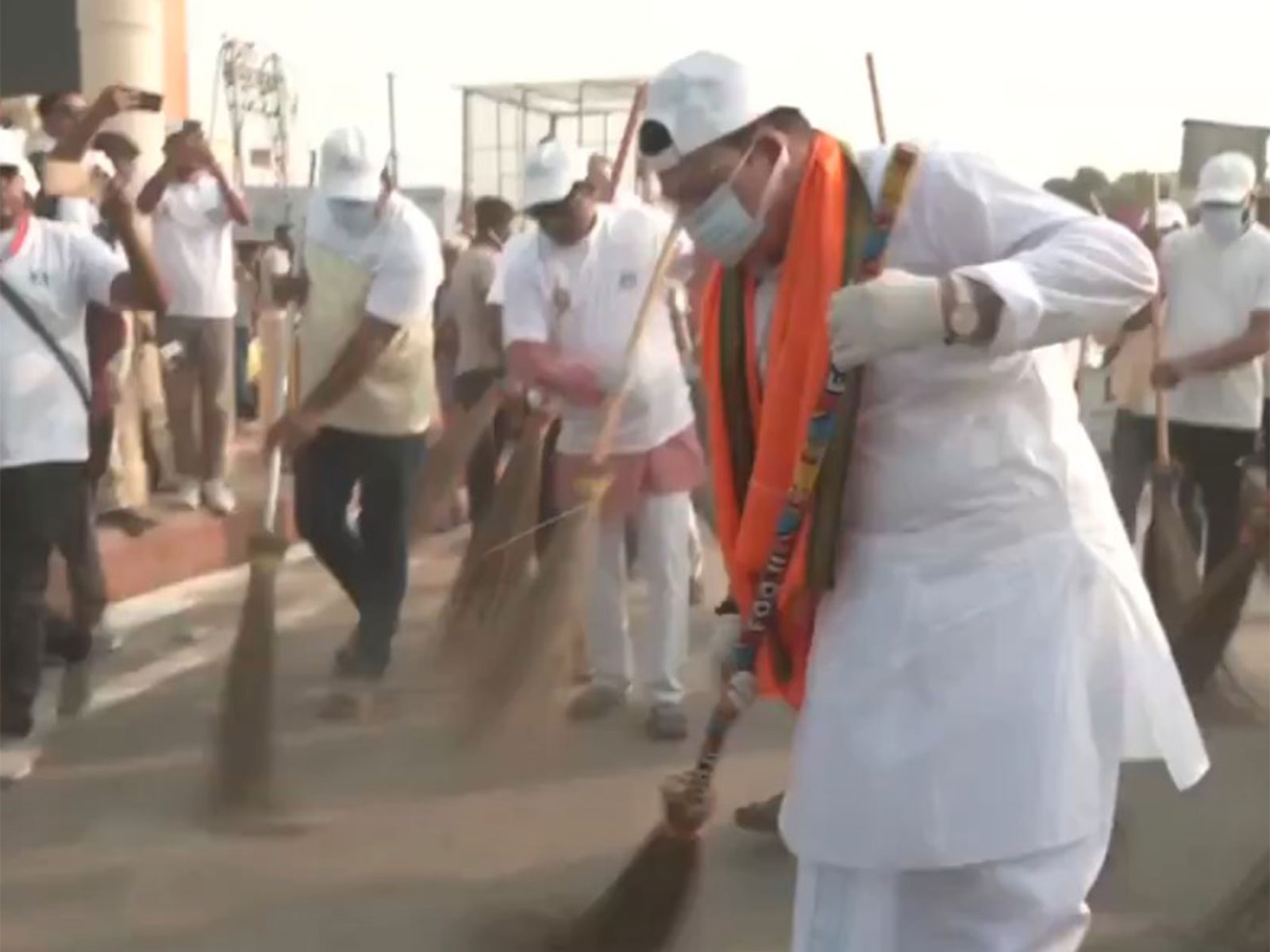Ayodhya mayor Girish Pati Tripathi participates in cleanliness drive (Photo/ANI)