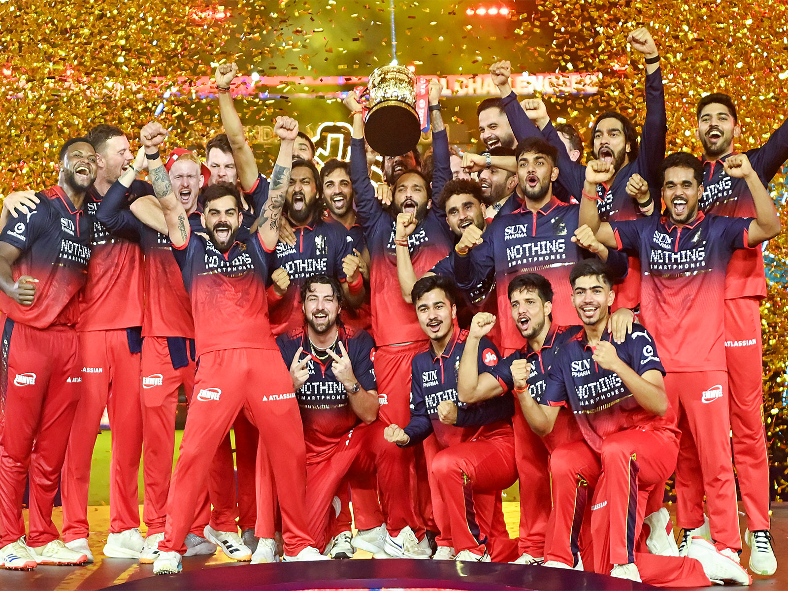 RCB players celebrating with trophy after IPL 2026 final win. (Photo/ANI) 