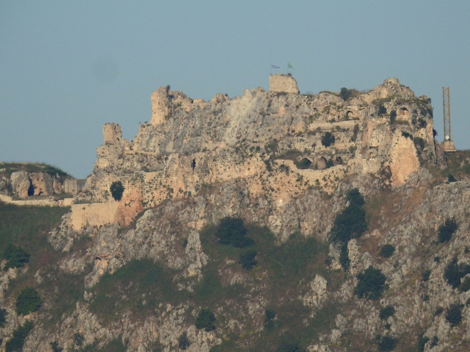 An Israeli flag and a flag of the Golani Brigade are raised on Beaufort Castle, as seen from Marjayoun, southern Lebanon (Photo/REUTERS)