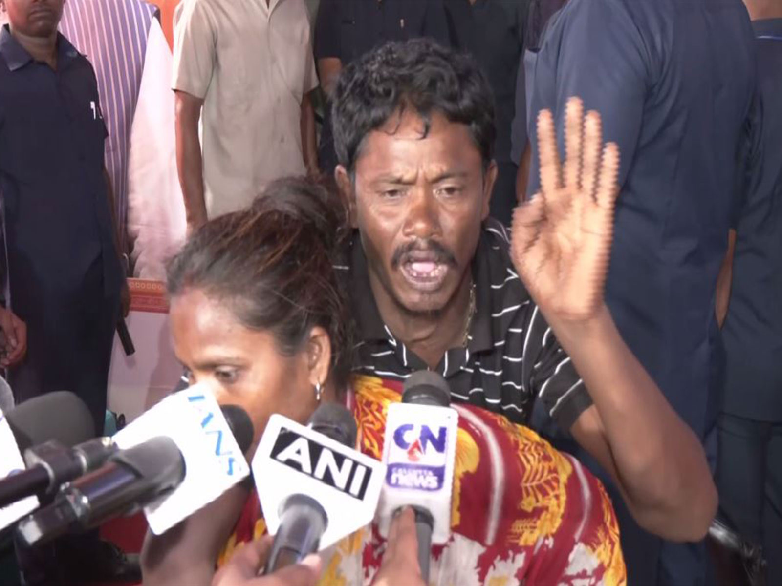 Wife carries husband on back to BJP office to meet CM Suvendu Adhikari (Photo/ANI)