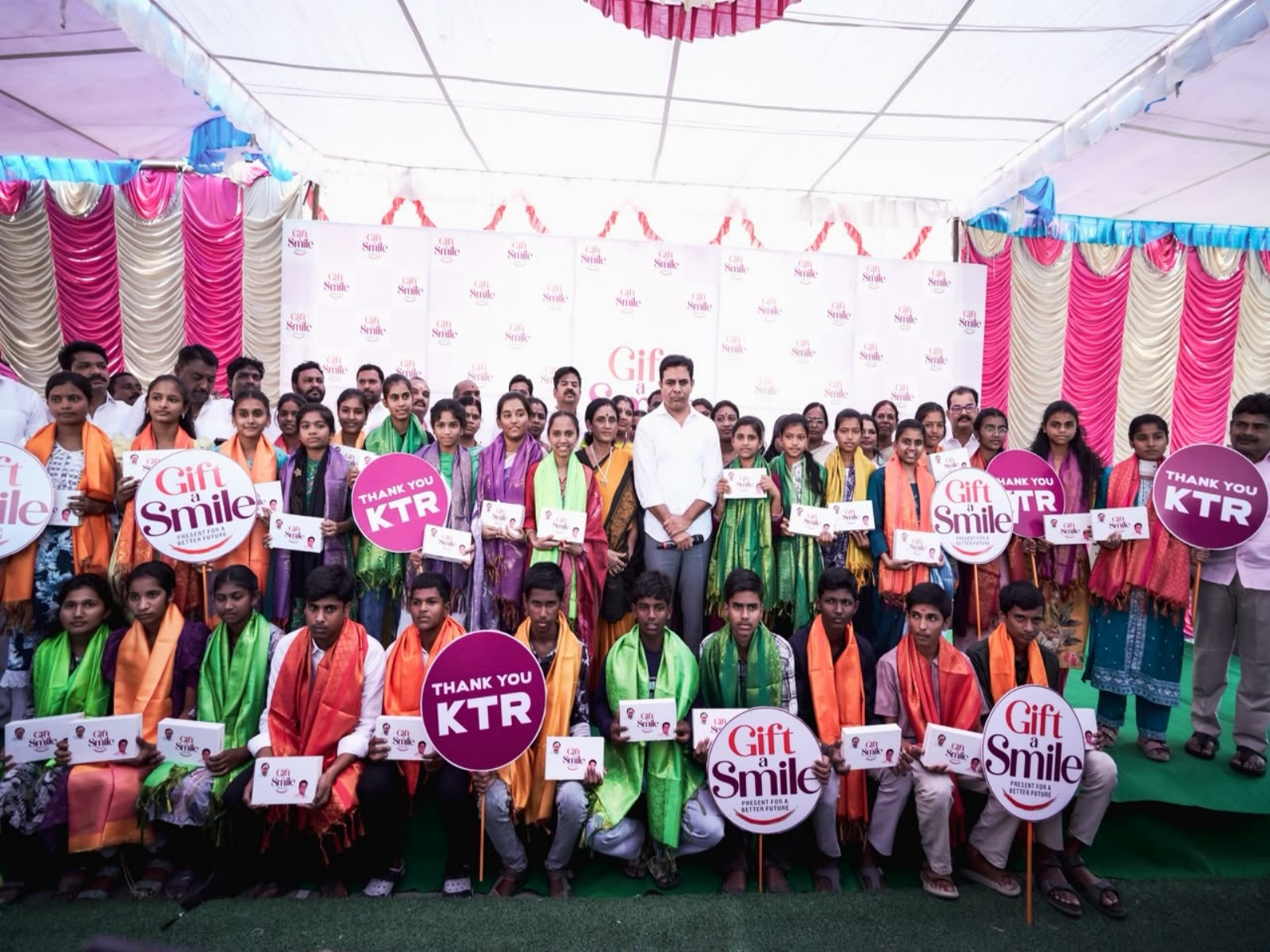 BRS Working President KT Rama Rao distributes tablets to students under 'Gift a Smile' program (Photo/BRS)
