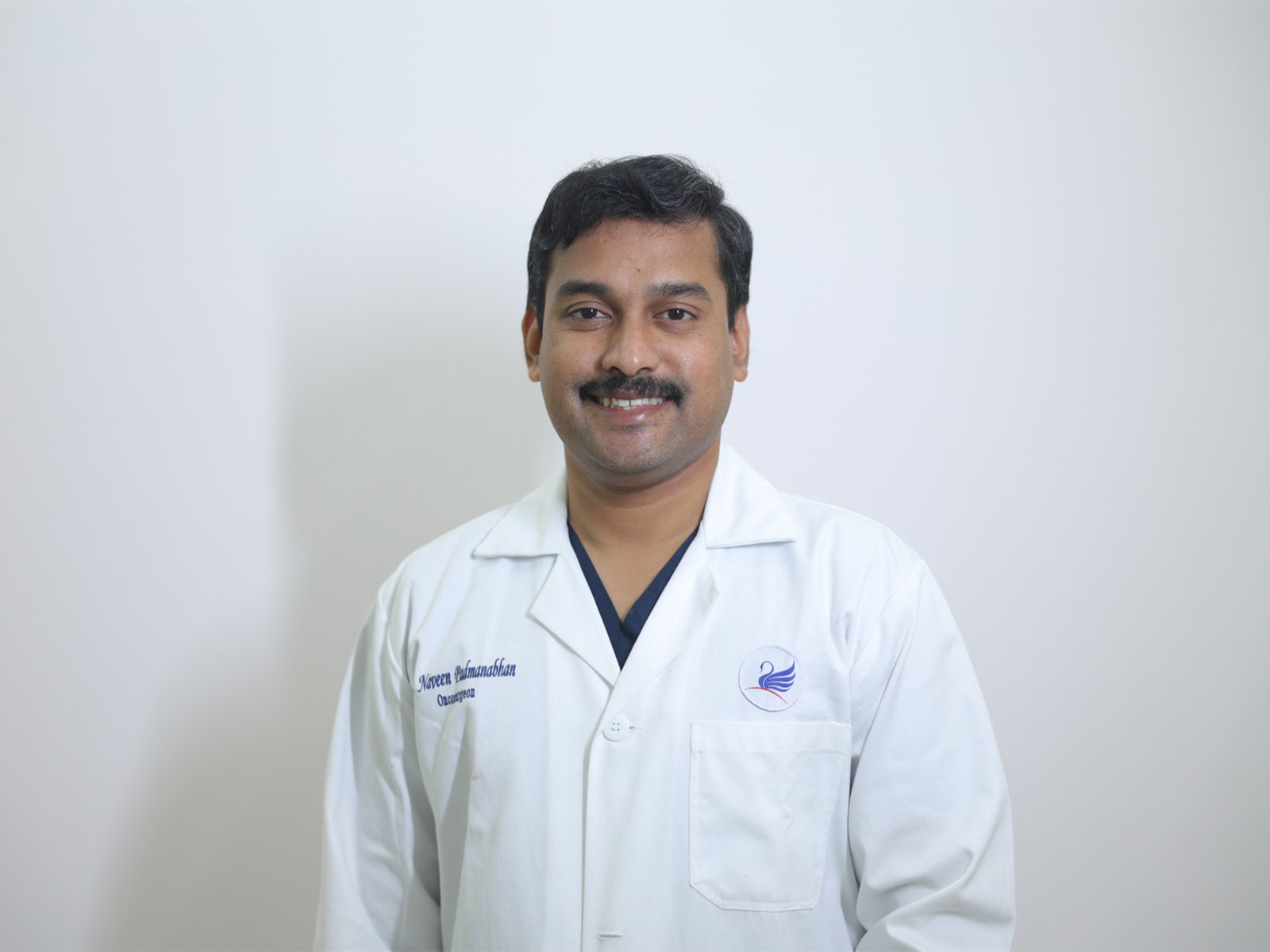 Dr. Naveen Padmanabhan, Consultant & Head of Surgical Oncology at Equitas Hospital, Chennai, Expert in GI, breast, and thoracic oncology