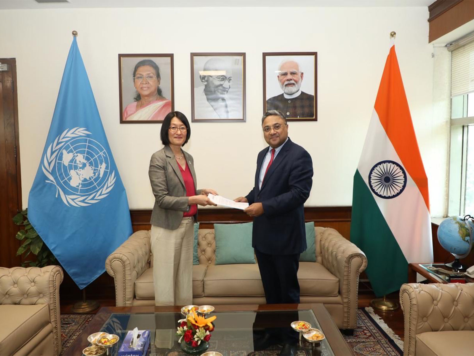 Secretary (West) Sibi George receives credentials from Shoko Ishikawa, Country Representative of the UN Women in India (Photo/X/@MEAIndia)