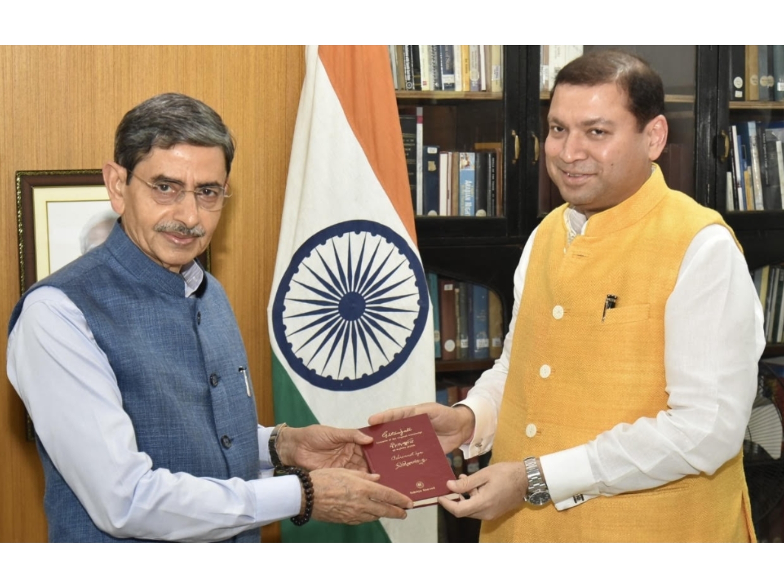 Cultural activist Sundeep Bhutoria presenting a handwritten copy of Tagore's Gitanjali to West Bengal Governor R N Ravi at Lok Bhavan, Kolkata