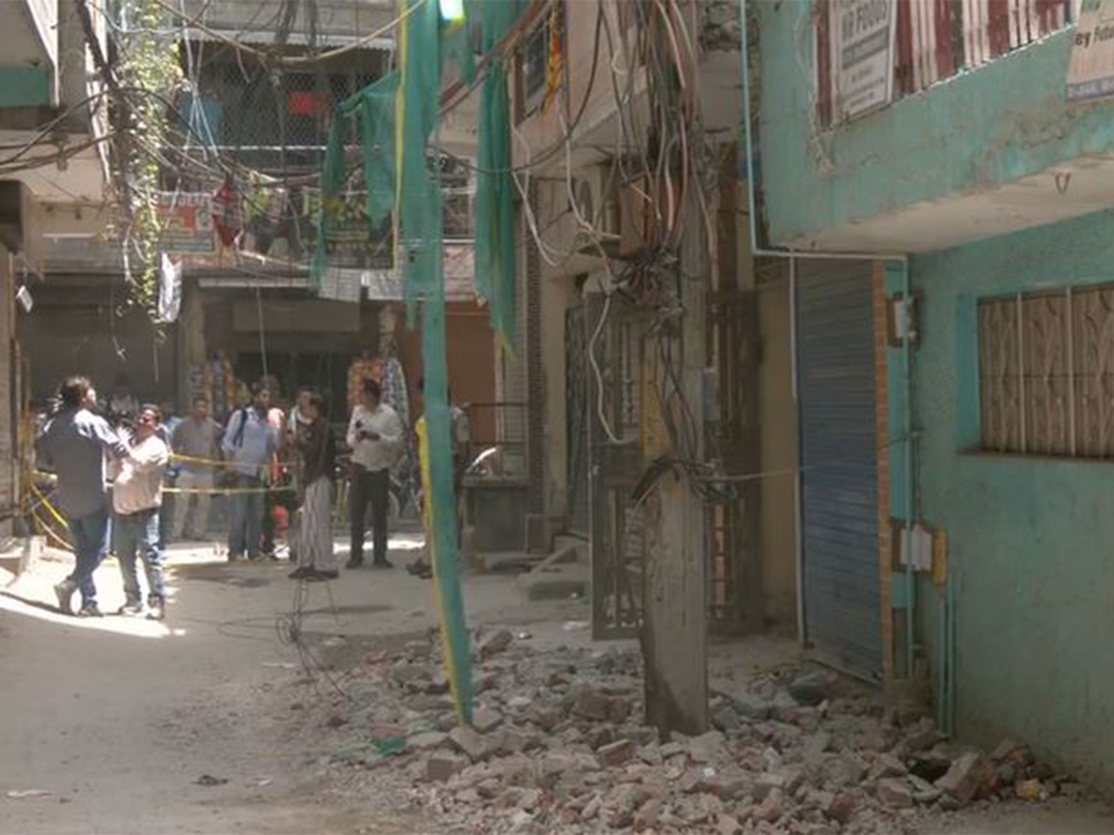 Demolition action against illegal multi-storey buildings at Khanpur and Sainik Farms.(Photo/ANI)
