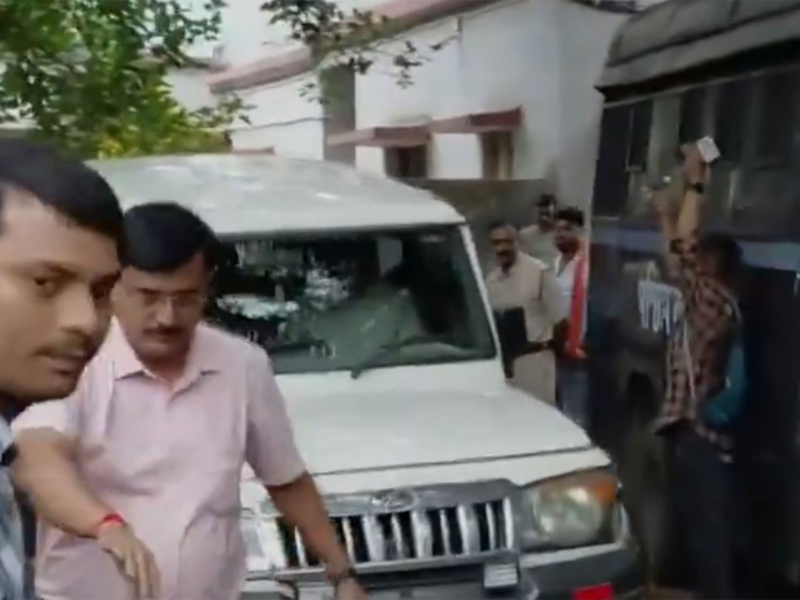 Locals hurl eggs at police vehicle carrying former TMC MLA Sujoy Hazra (Photo/ANI)
