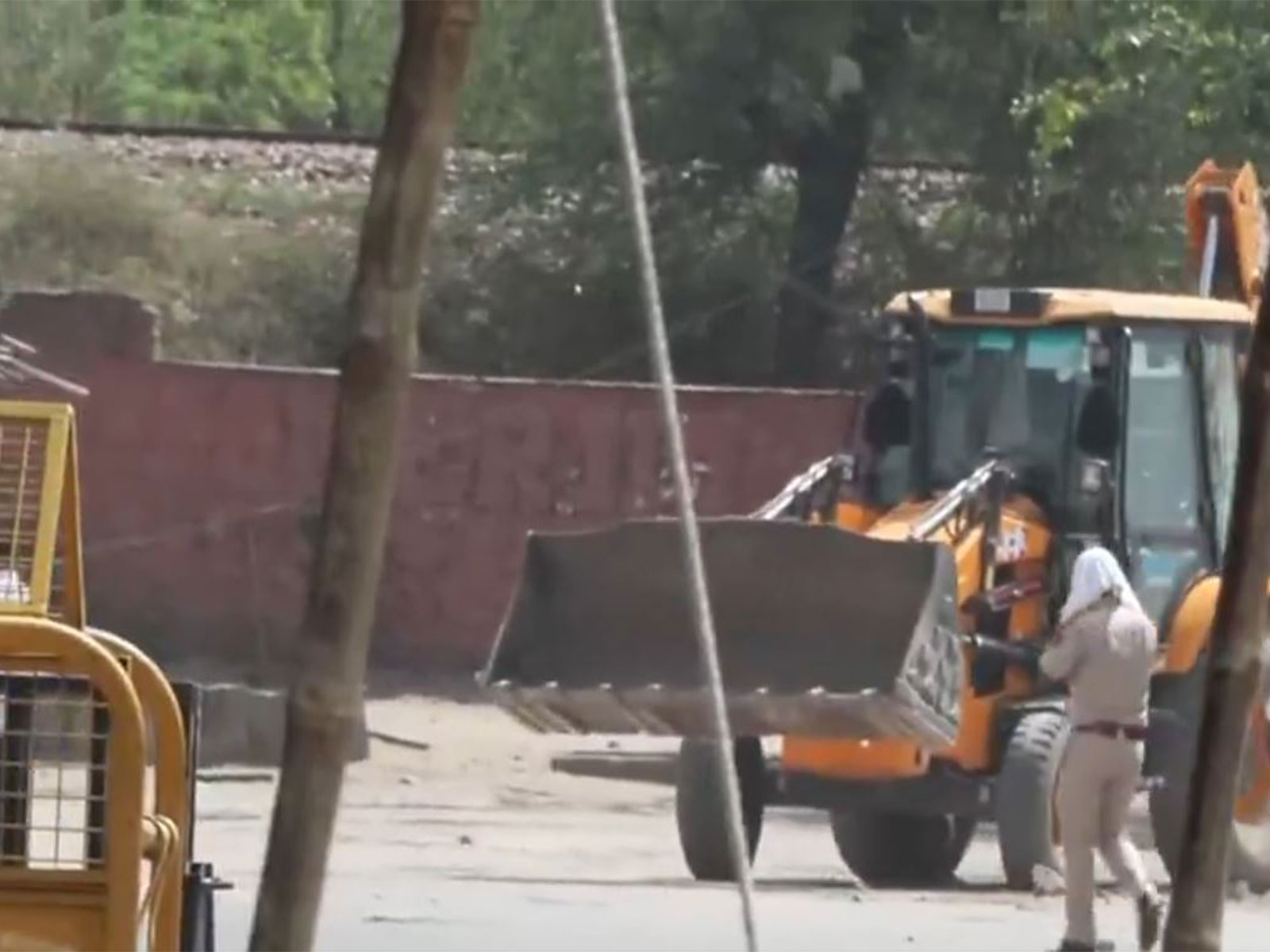 Police personnel maintain vigil in Jaipur as the JDA anti-encroachment drive remains ongoing (Photo/ANI)