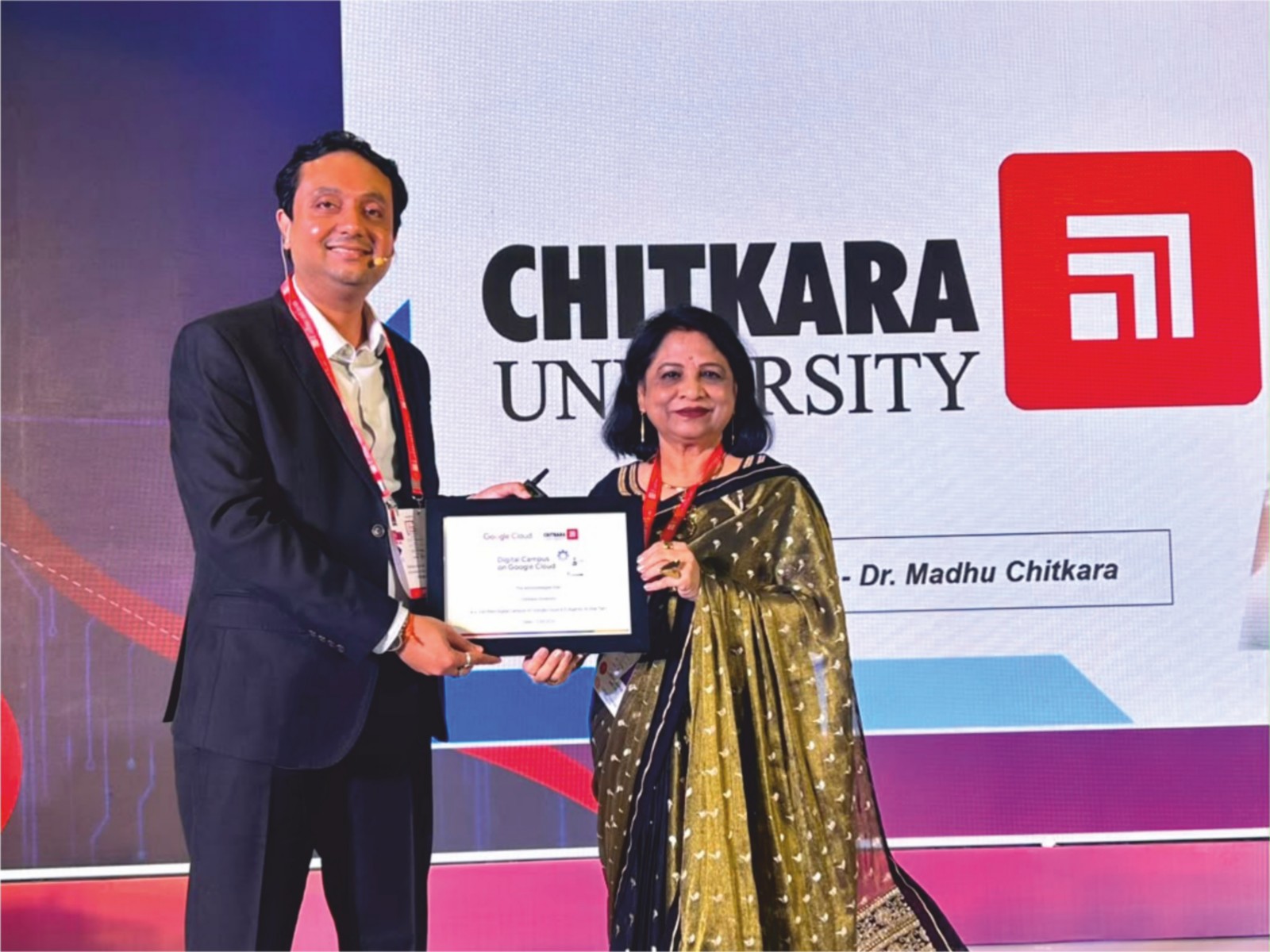 Vaibhav Srivastava, India Head-EdTechs & Education, Google Cloud, presents a plaque to Dr. Madhu Chitkara at the launch of Digital Campus on Google Cloud 4.0