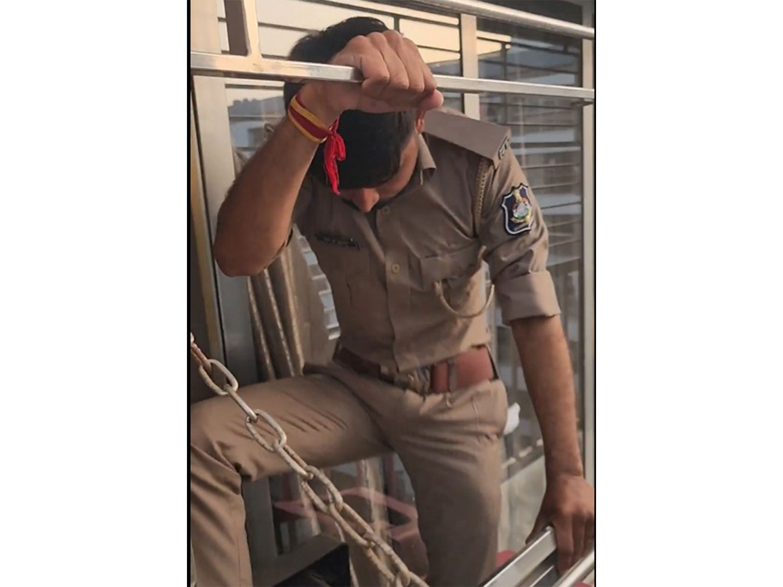 Heroic Surat Cop climbs exterior grille on seventh floor to rescue man (Photo/X@sanghaviharsh)