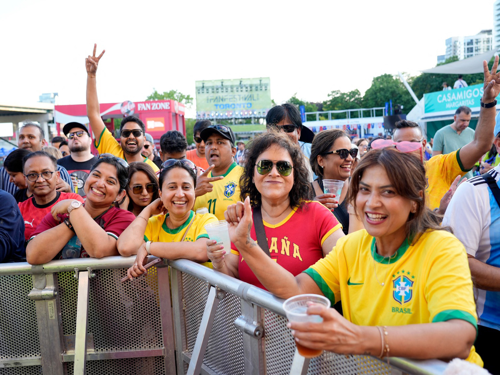 Fans cheer outside the stadium ahead of the countdown concert. (Photo: Reuters)