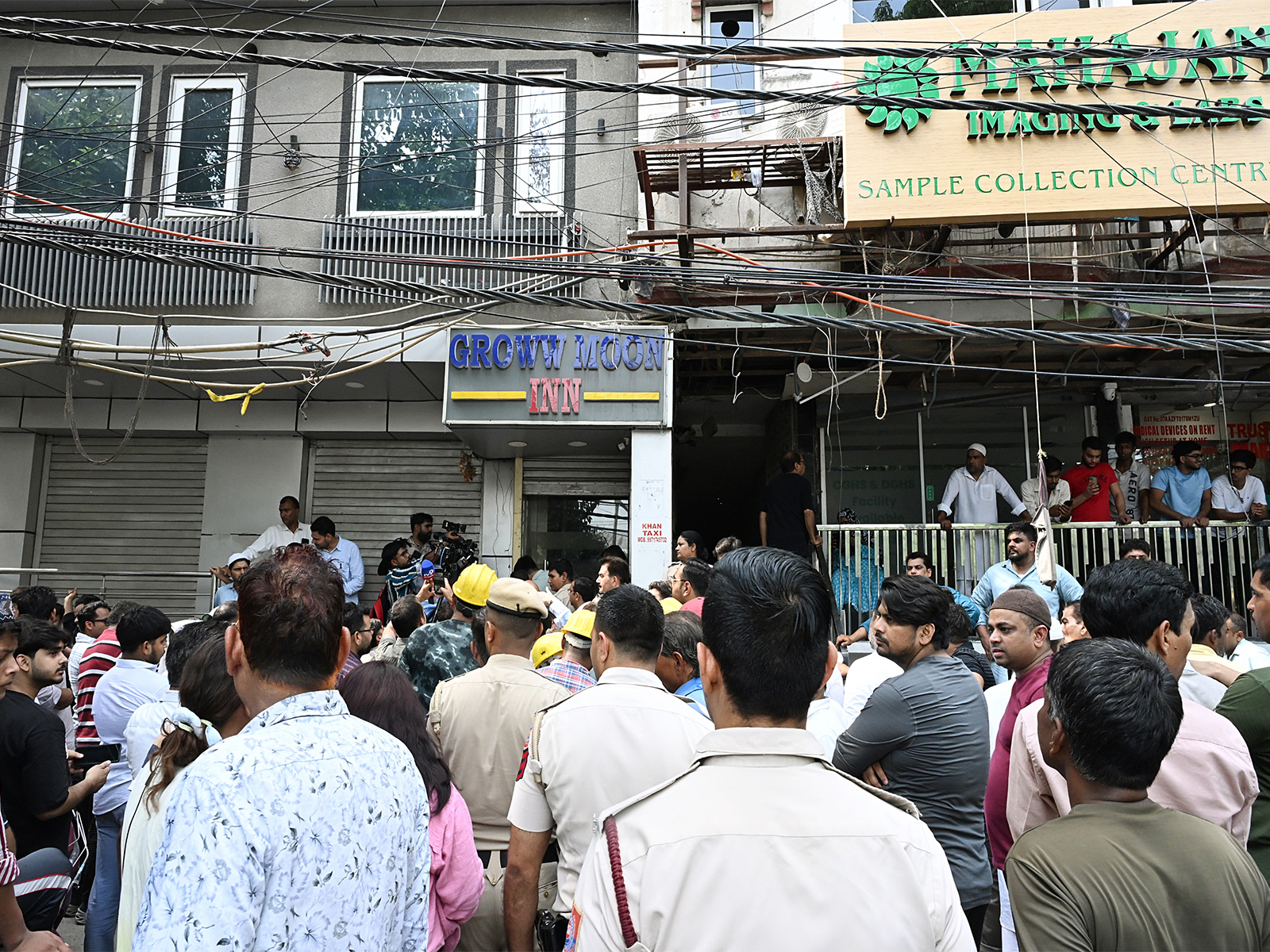 Delhi Police & Local Authorities seal B&B buildings in Malviya Nagar's Hauz Rani area (Photo/ANI)
