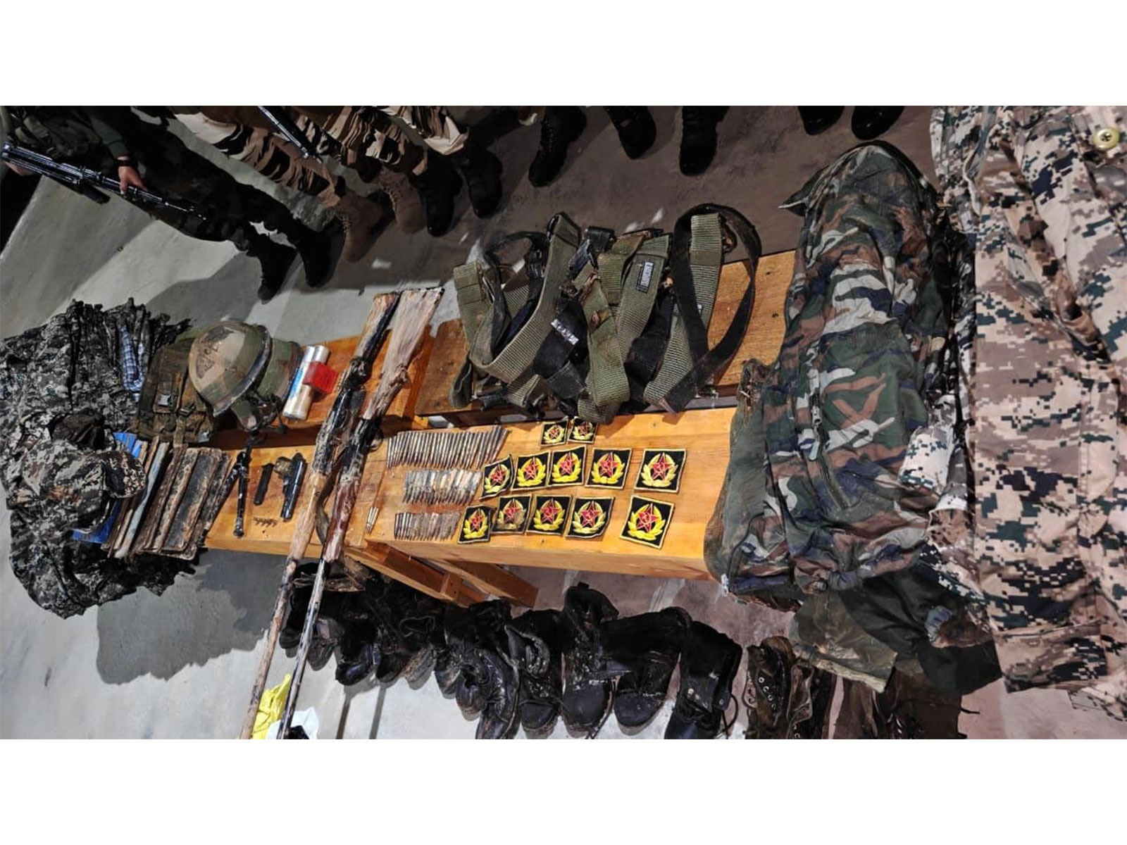 Massive cache of arms and combat gear recovered during a joint search operation in Kakching, Manipur (Photo/@official_dgar)
