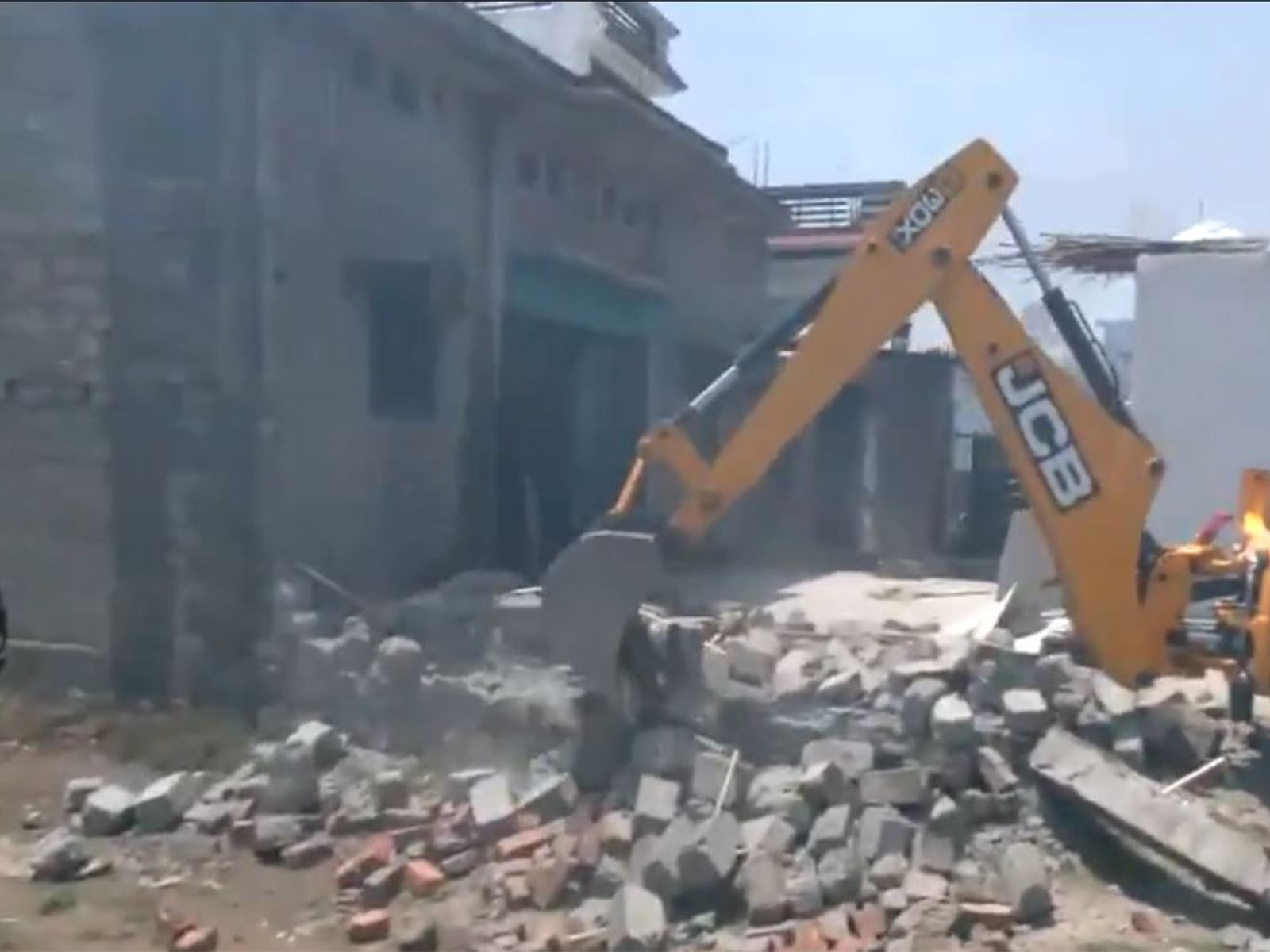 Demolition underway at the residence of an accused in Bairagiwala communal violence case in Sahaspur, Dehradun (Photo/ANI)