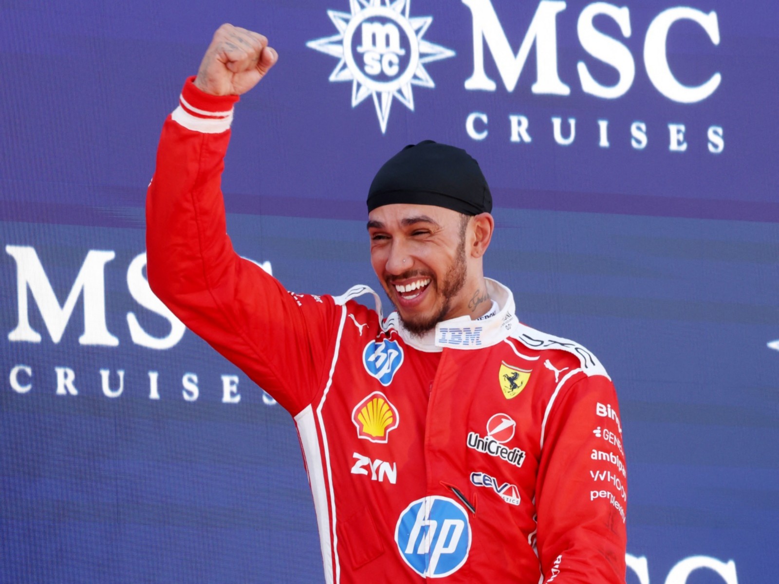 Formula One - Barcelona-Catalunya Grand Prix - Circuit de Barcelona-Catalunya, Barcelona, Spain - June 14, 2026 Ferrari's Lewis Hamilton celebrates on the podium after winning the Barcelona-Catalunya GP (Photo: Reuters/Bruna Casas)