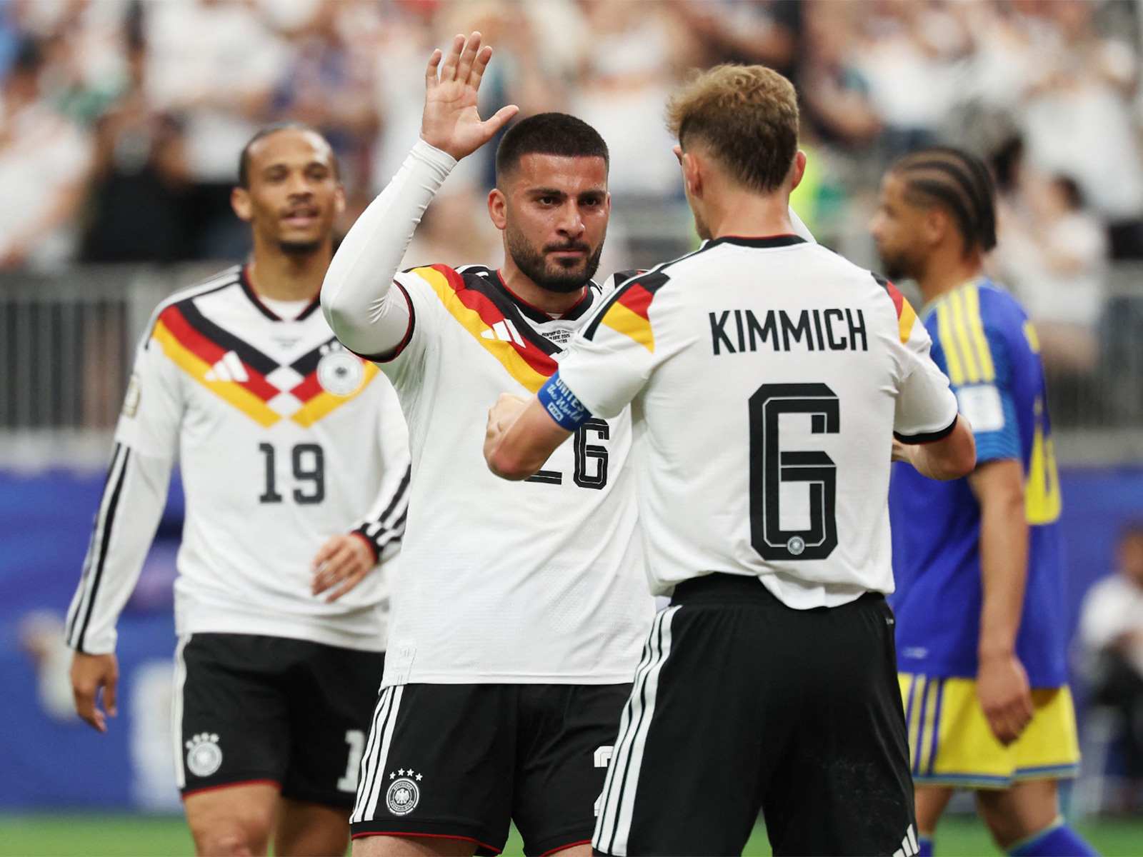 Soccer Football - FIFA World Cup 2026 - Group E - Germany v Curacao - Houston Stadium, Houston, Texas, U.S. - June 14, 2026 Germany's Deniz Undav celebrates scoring their sixth goal with Joshua Kimmich and Leroy Sane. (Photo/Reuters)